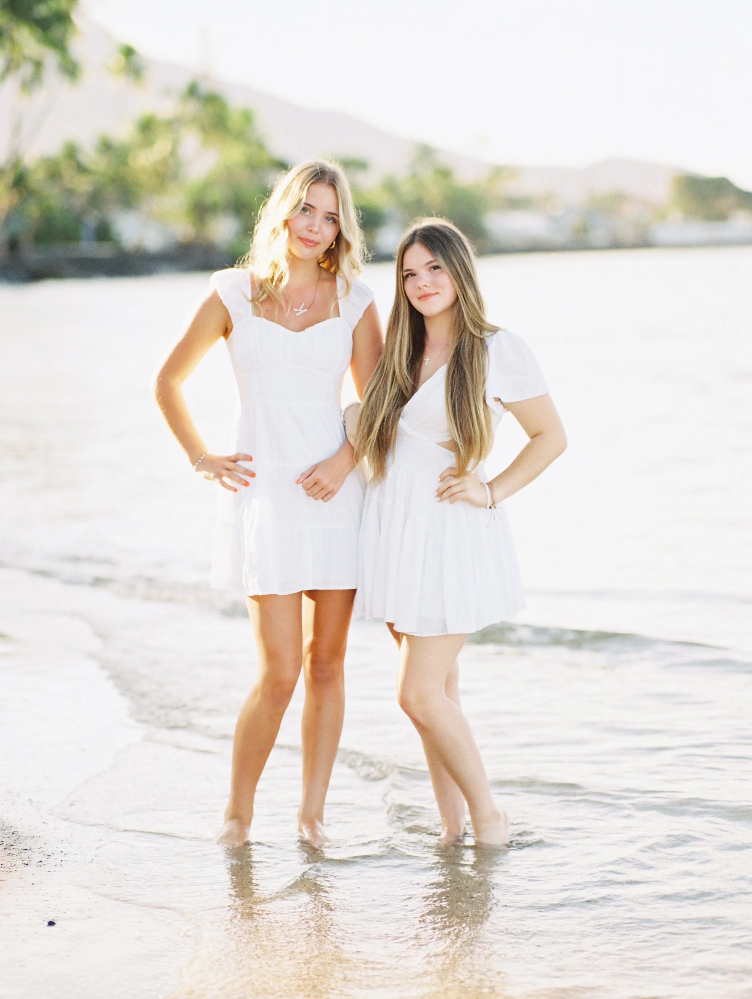 Senior photos taken in Lahaina Maui on film in on the beach during golden hour.