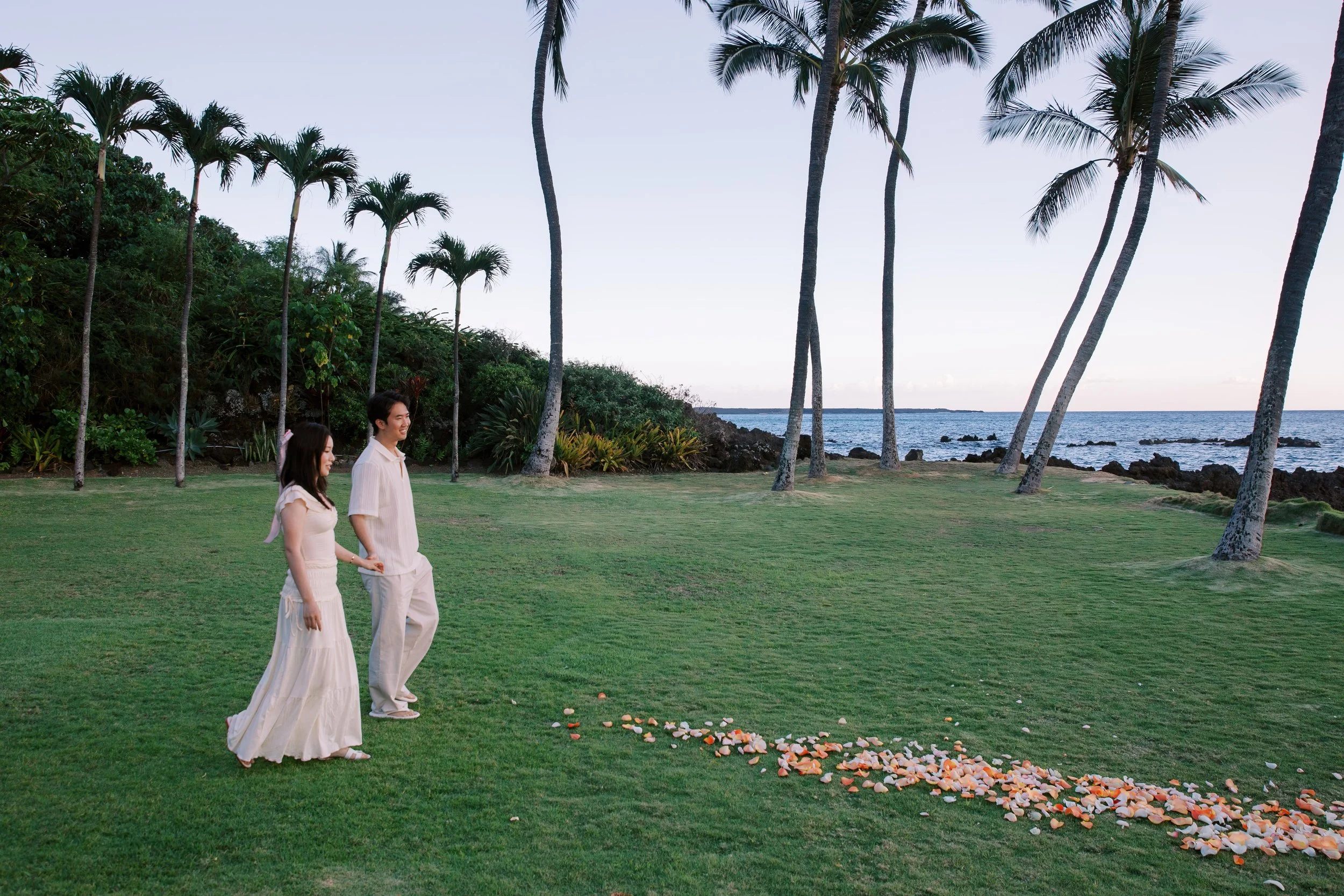 A sunset private proposal at White Orchid Beach House in Makena.