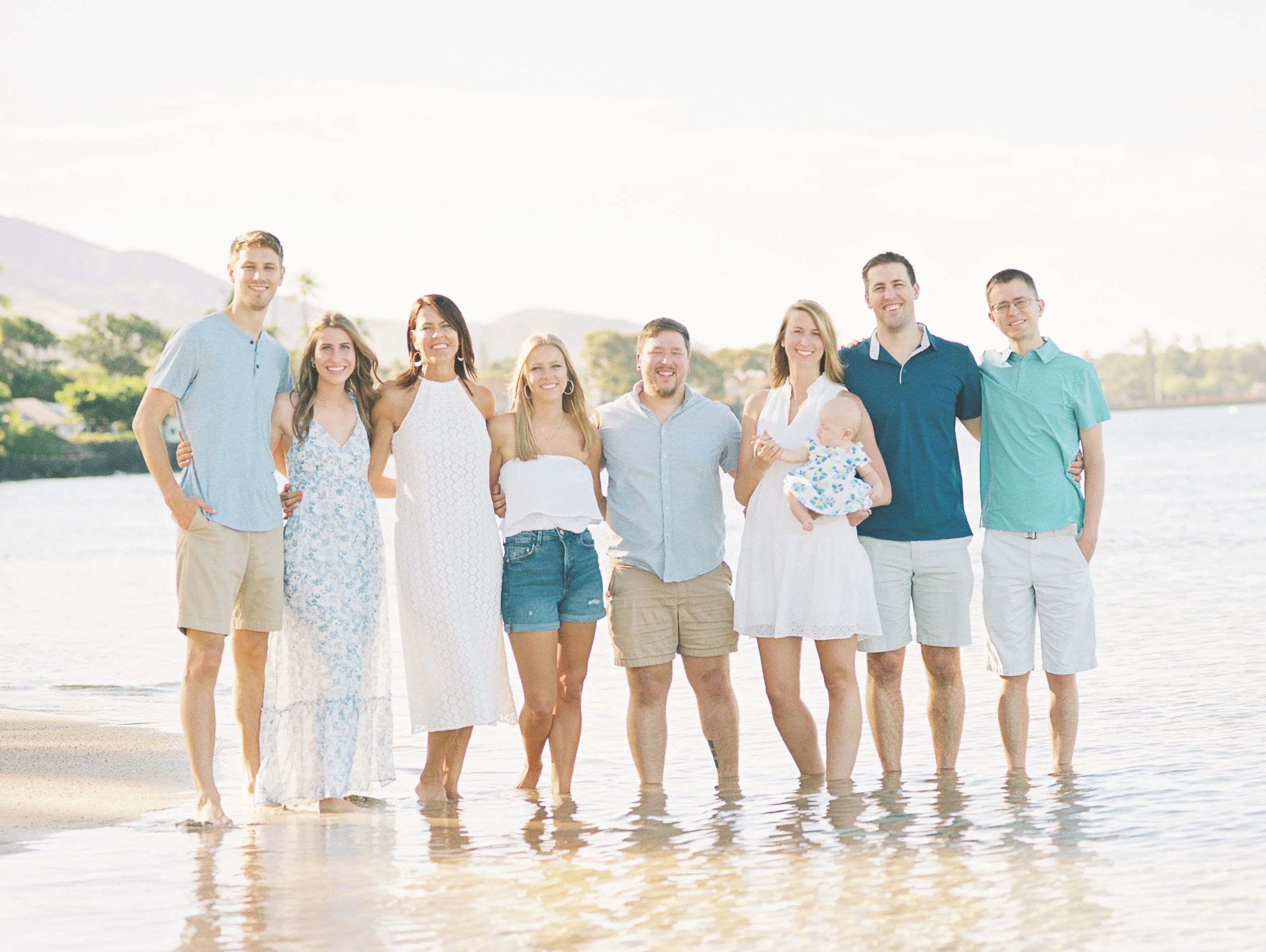 A family photoshoot captured on film on a beach in Lahaina Maui Hawaii.