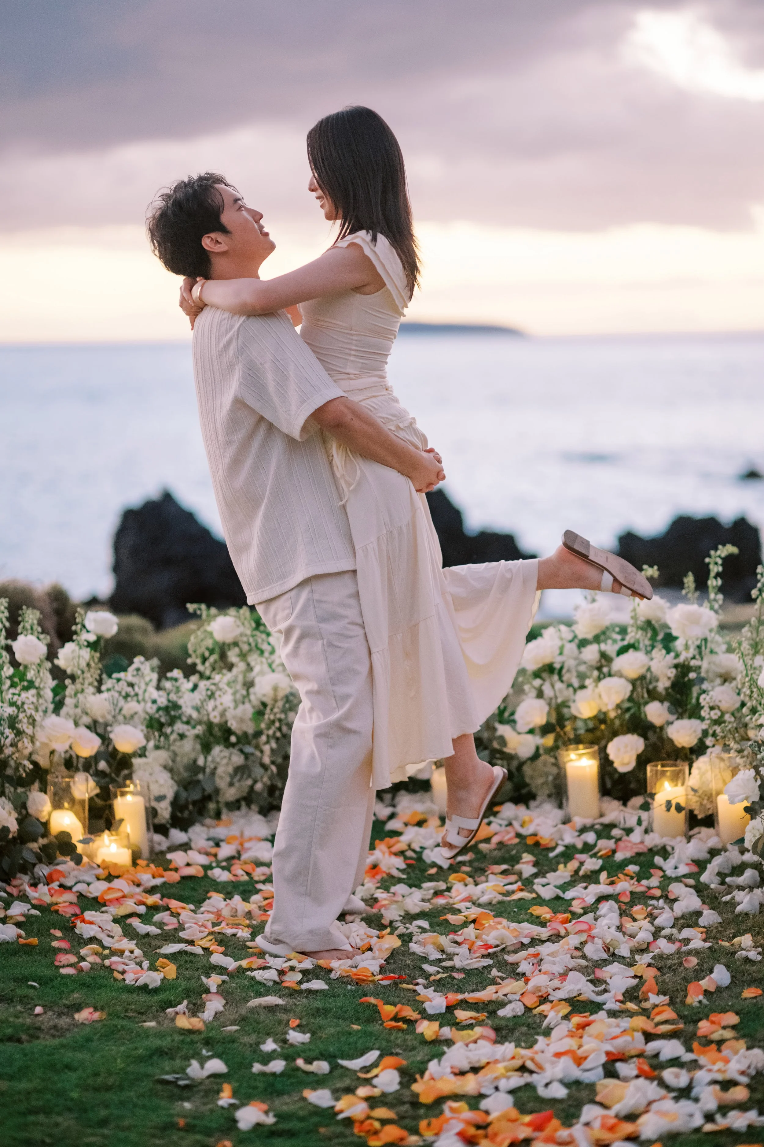 A stunning south side proposal in Maui Hawaii captured at sunset at the White Orchid Beach House in Makena.