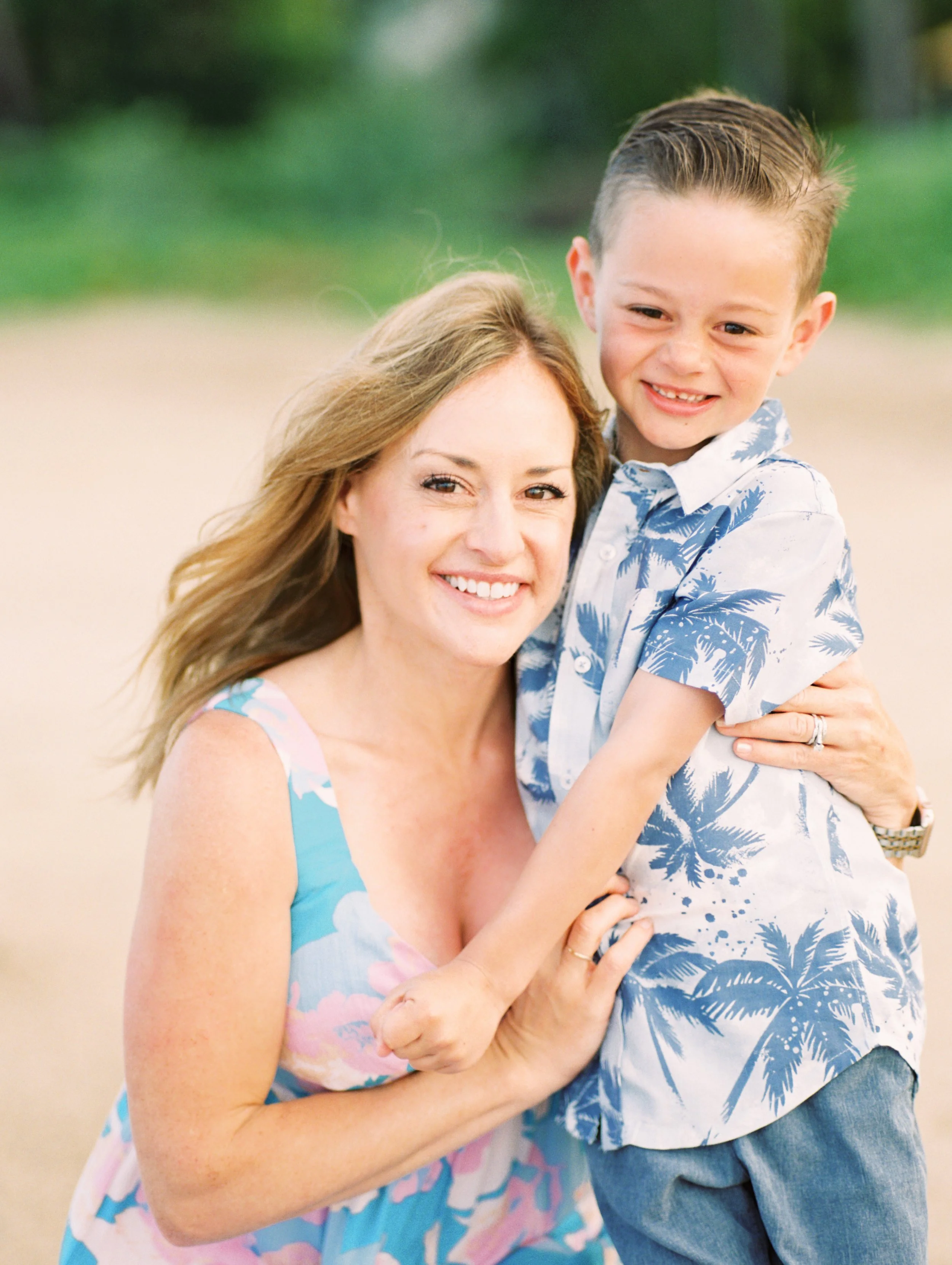 Family enjoying the beach during a film photography session in Maui.
