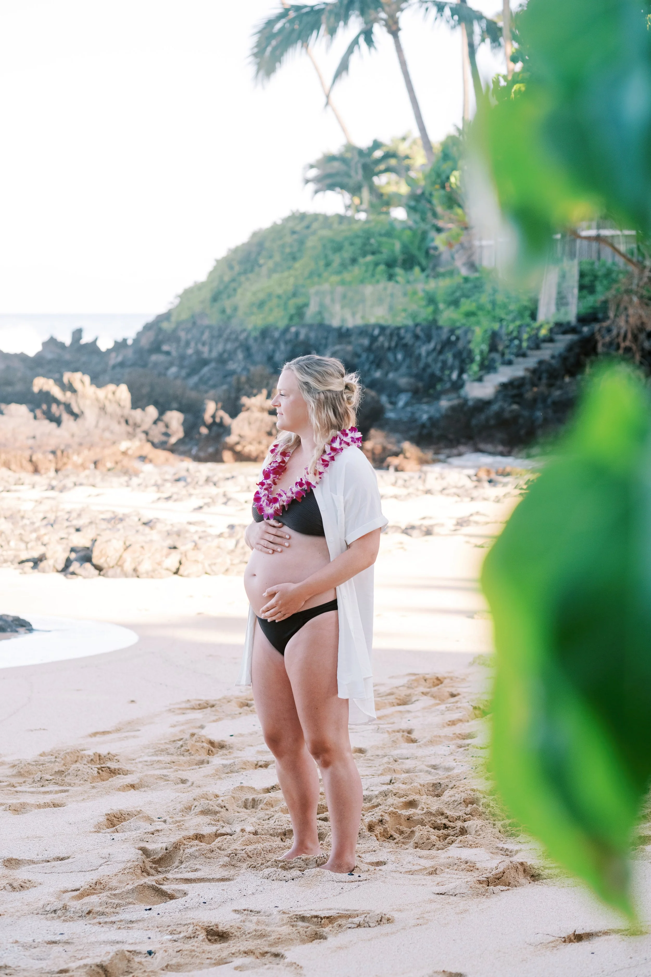 A glowing morning maternity photoshoot at Makena Cove at sunrise on Maui.