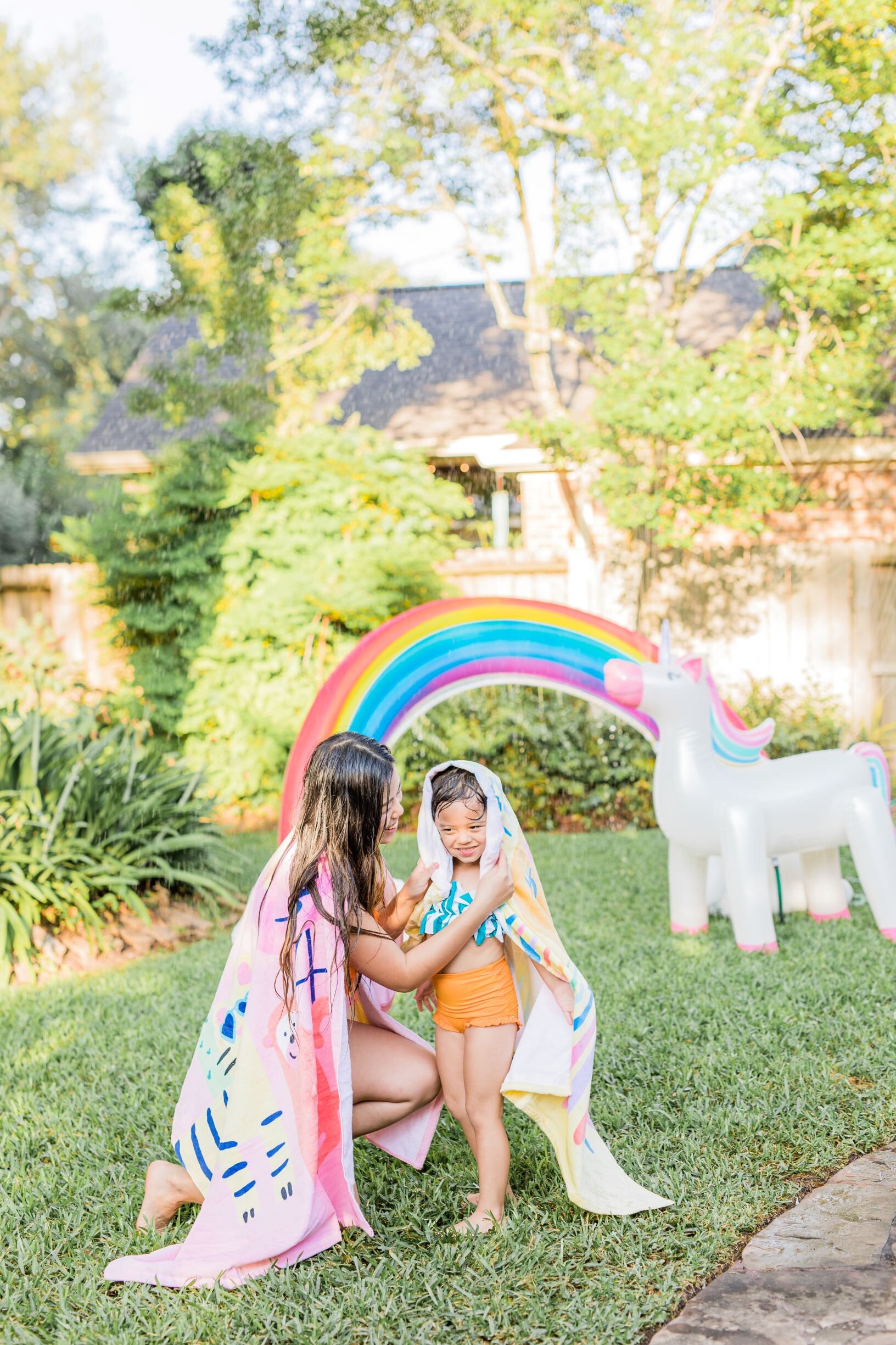 Summer Rainbow Kid Styled Backyard Splash Bash Rainbow and Unicorn Sprinkler Fun
