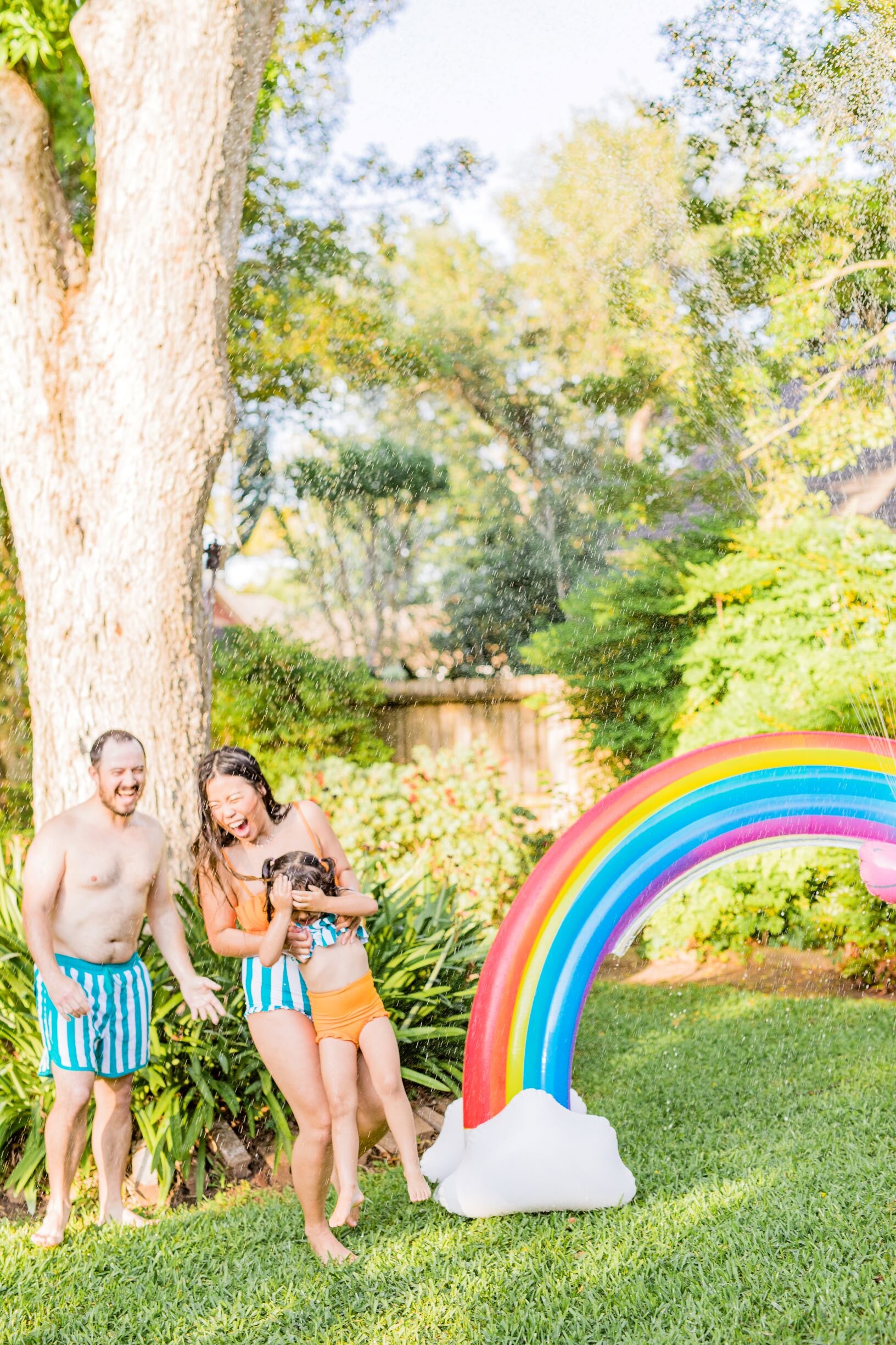 Summer Rainbow Kid Styled Backyard Splash Bash Rainbow and Unicorn Sprinkler