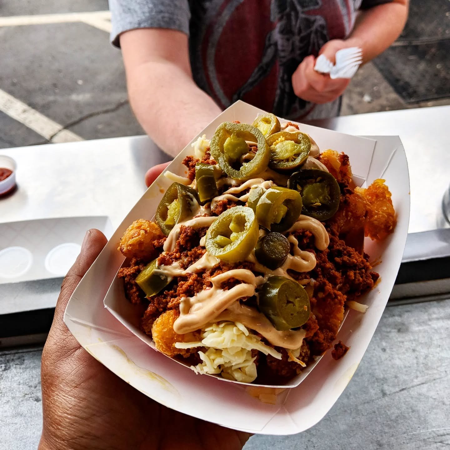 TOTCHOS. We haven't done these in a while, but y'know what?? We're feeling it. Taco seasoned beef, cheese (duh), jalape&ntilde;os, chipotle aioli (add some sour cream maybe?) If you're into that, come see us at KARE Fest in Guilford this weekend!