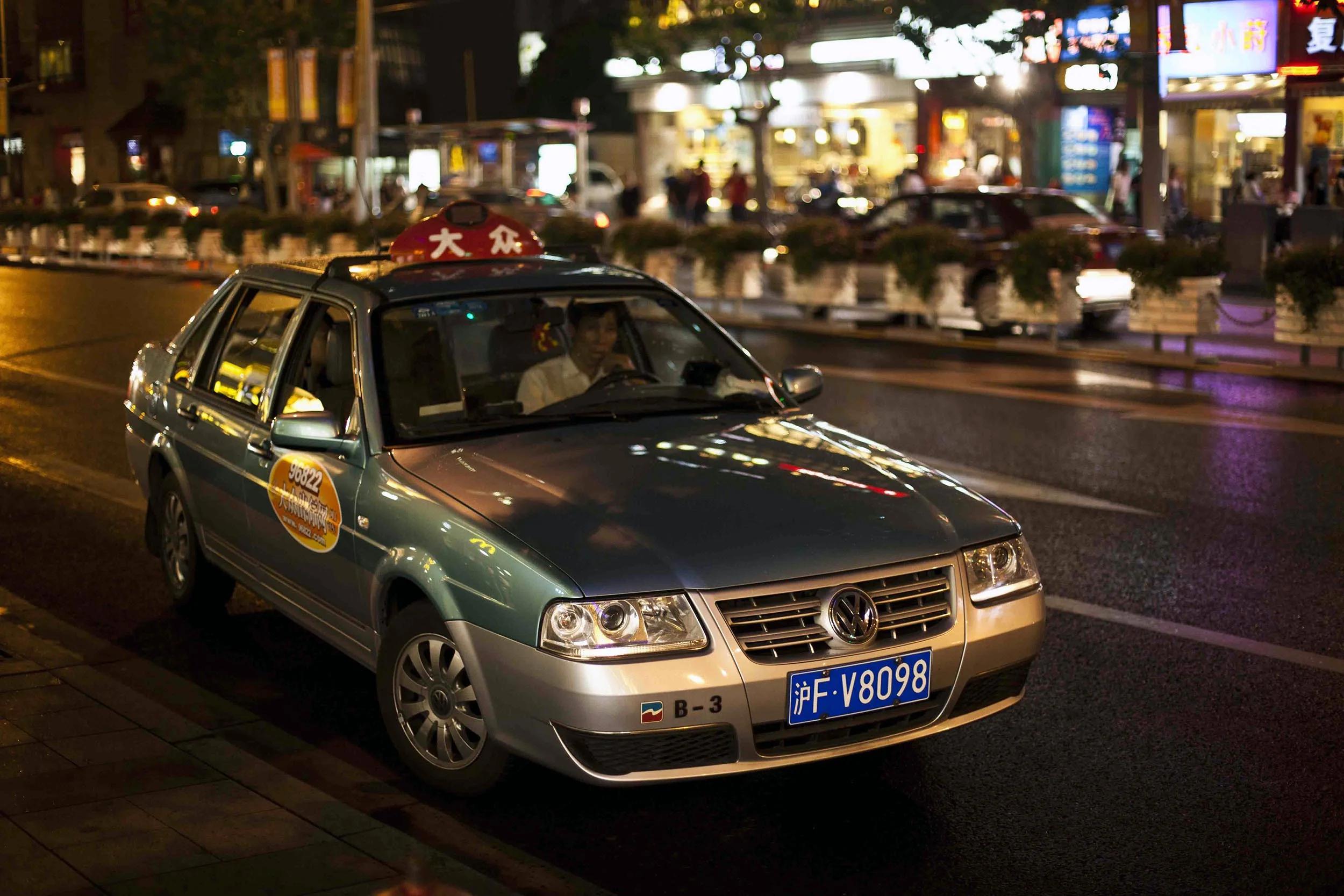 A photograph of a taxi at night Shanghai, China Photography for personal project