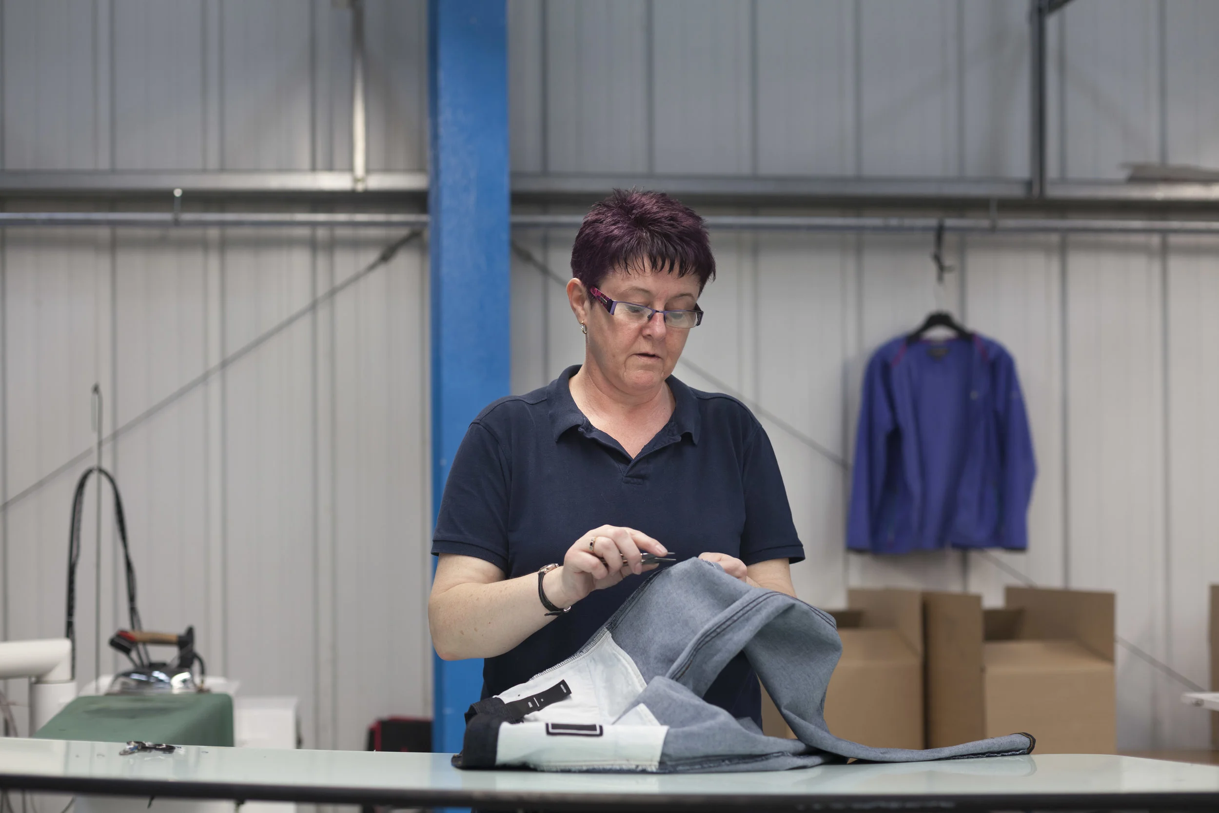 A documentary photograph of work taking place at the Cookson Clegg factory, Lancashire. Part of a commercial photography commission for Finisterre
