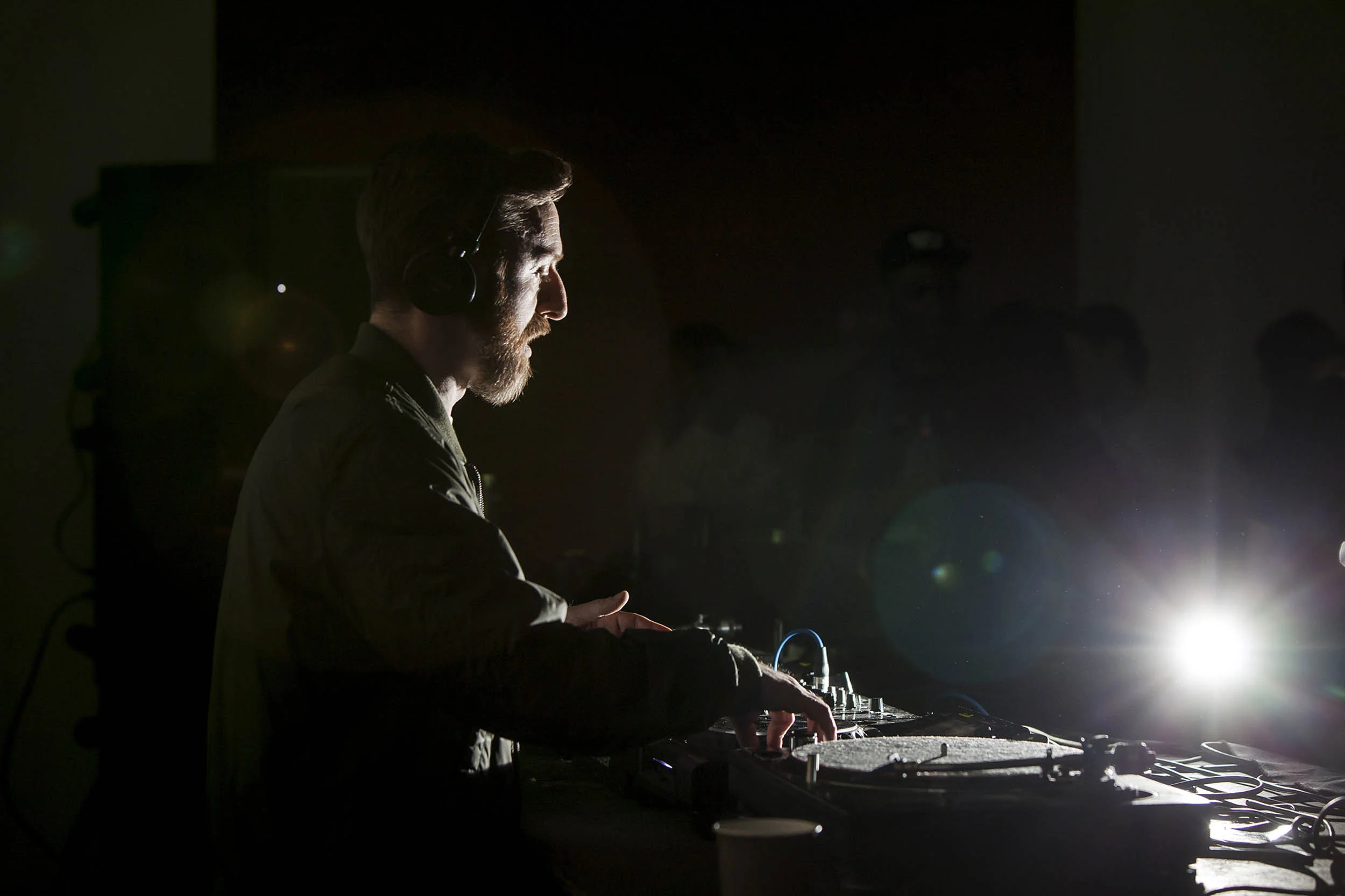 A documentary photograph of a DJ from NTS during an event at Whitworth Art gallery Photography commissioned by Whitworth Art Gallery