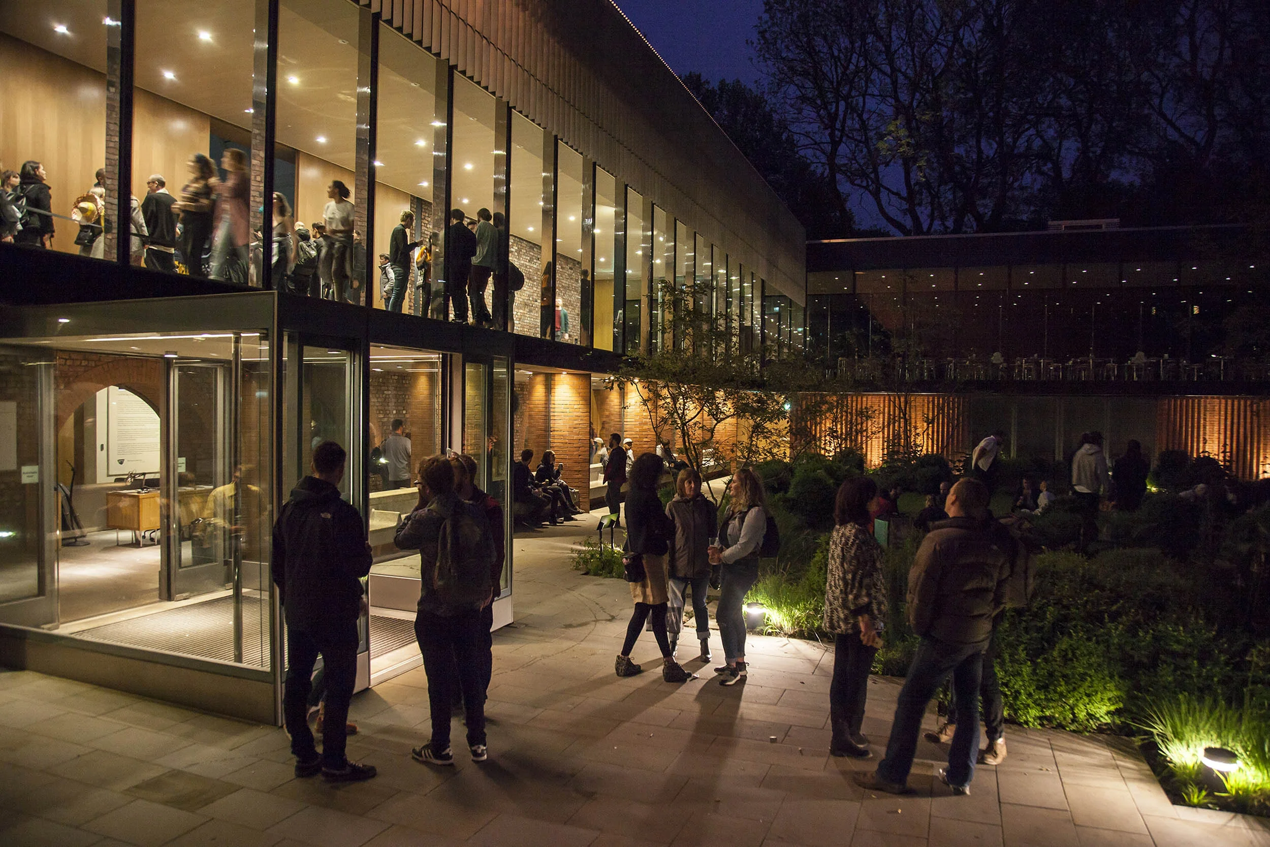 A documentary photograph of the public outdoors during an art opening. Photography commissioned by Whitworth Art Gallery, Manchester