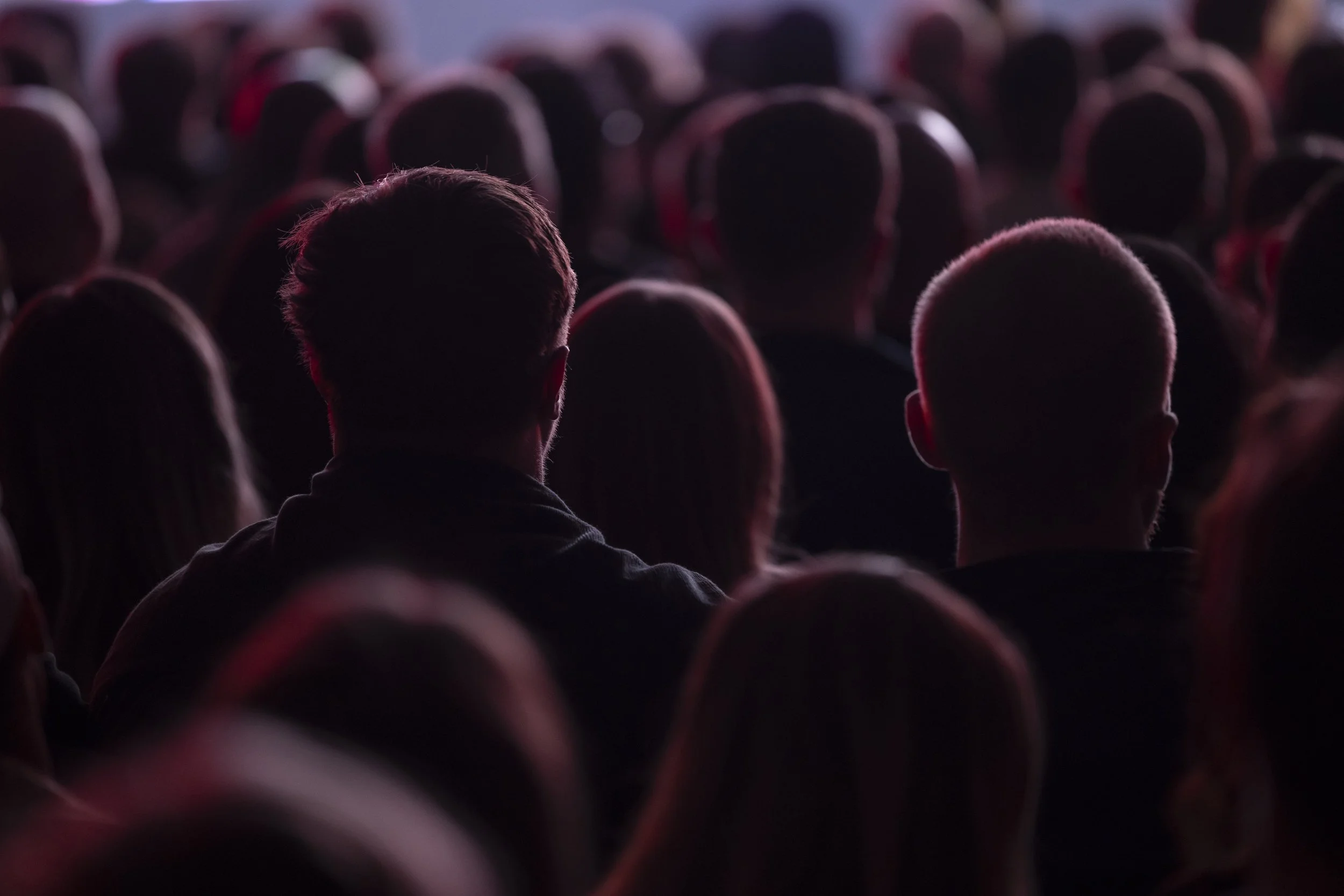  A photograph of an event for adidas in Factory International, Manchester in which audience members are seen from behind   