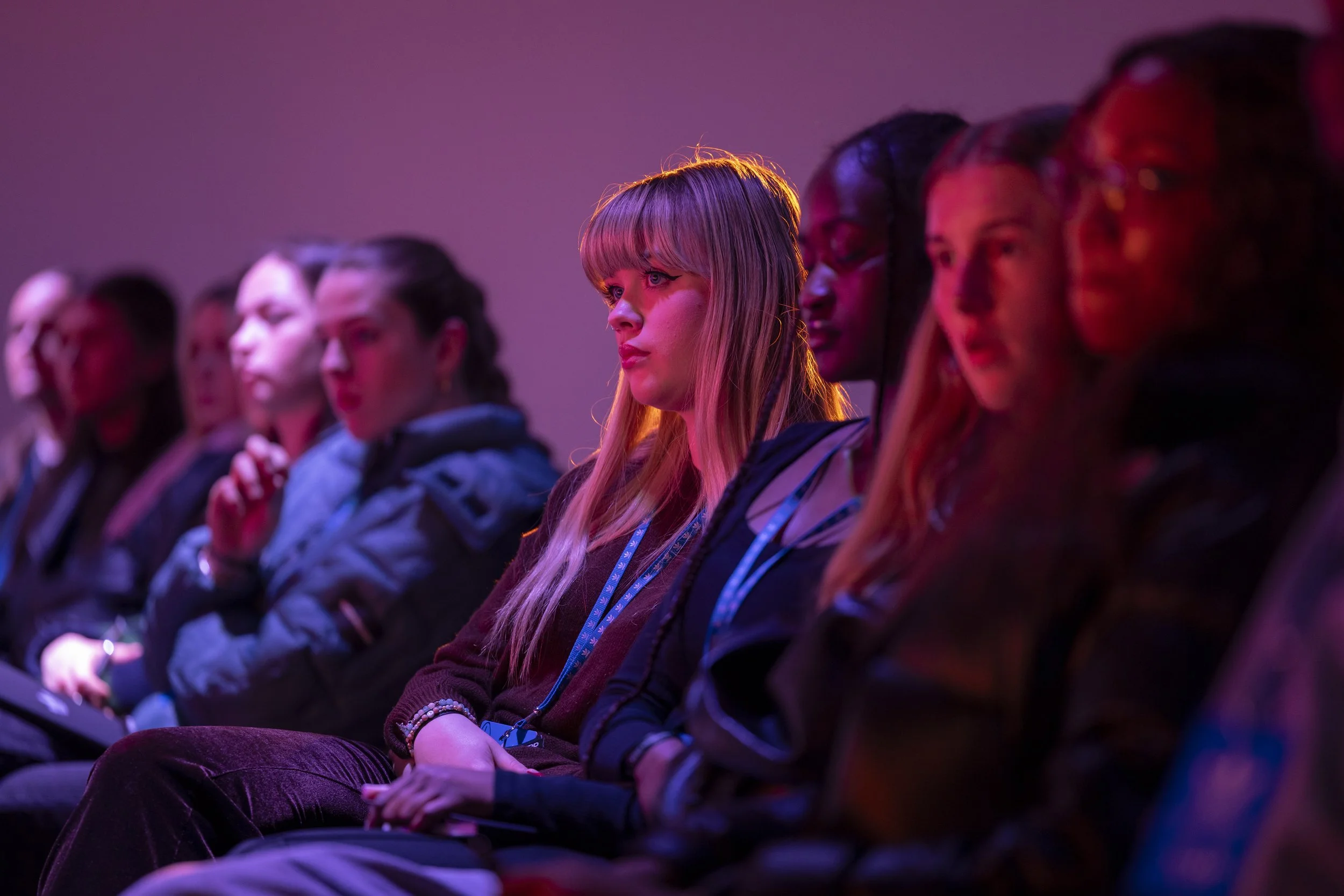  A photograph of an event for adidas in Factory International, Manchester in which staff members watch a presentation on stage  Corporate event photography by David Oates 