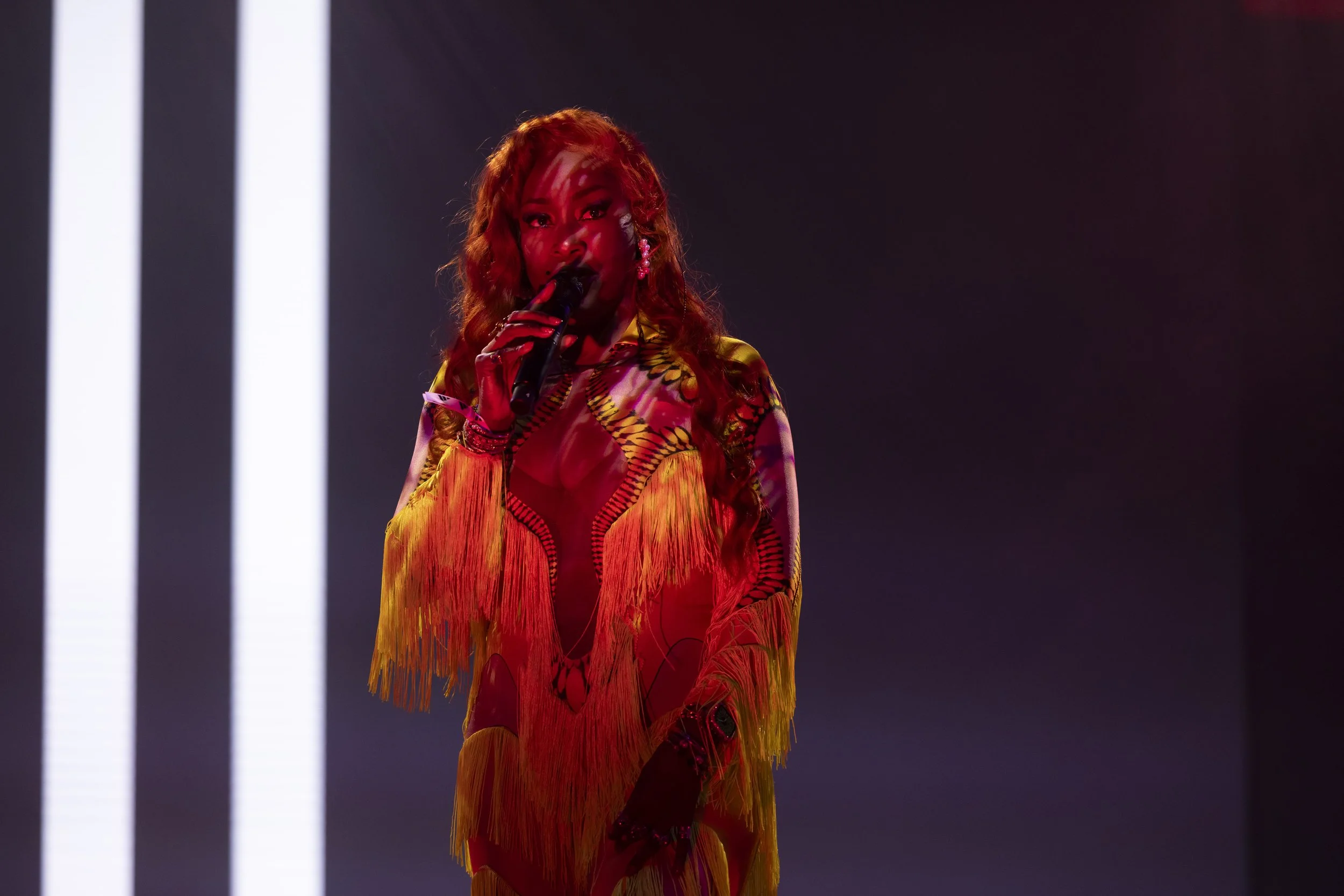  A photograph of an event for adidas in Factory International, Manchester in which a woman sings on stage   