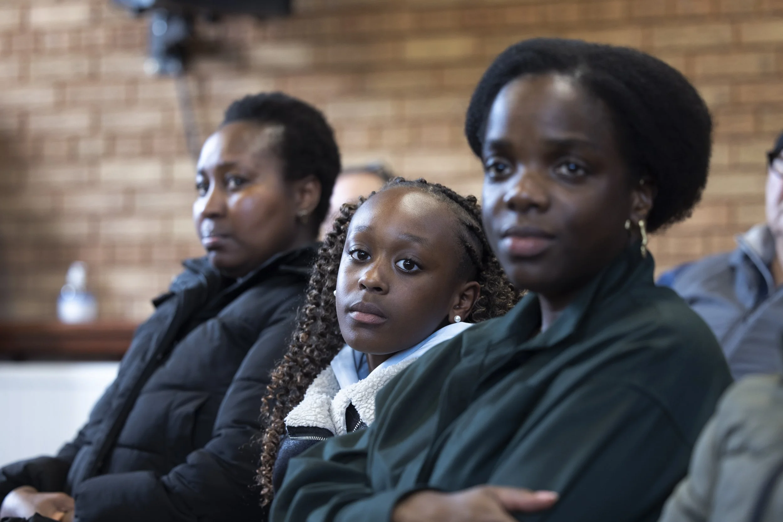 Audience members of African descent watching Olympias Music Foundation concert in Manchester – documentary photography by David Oates 