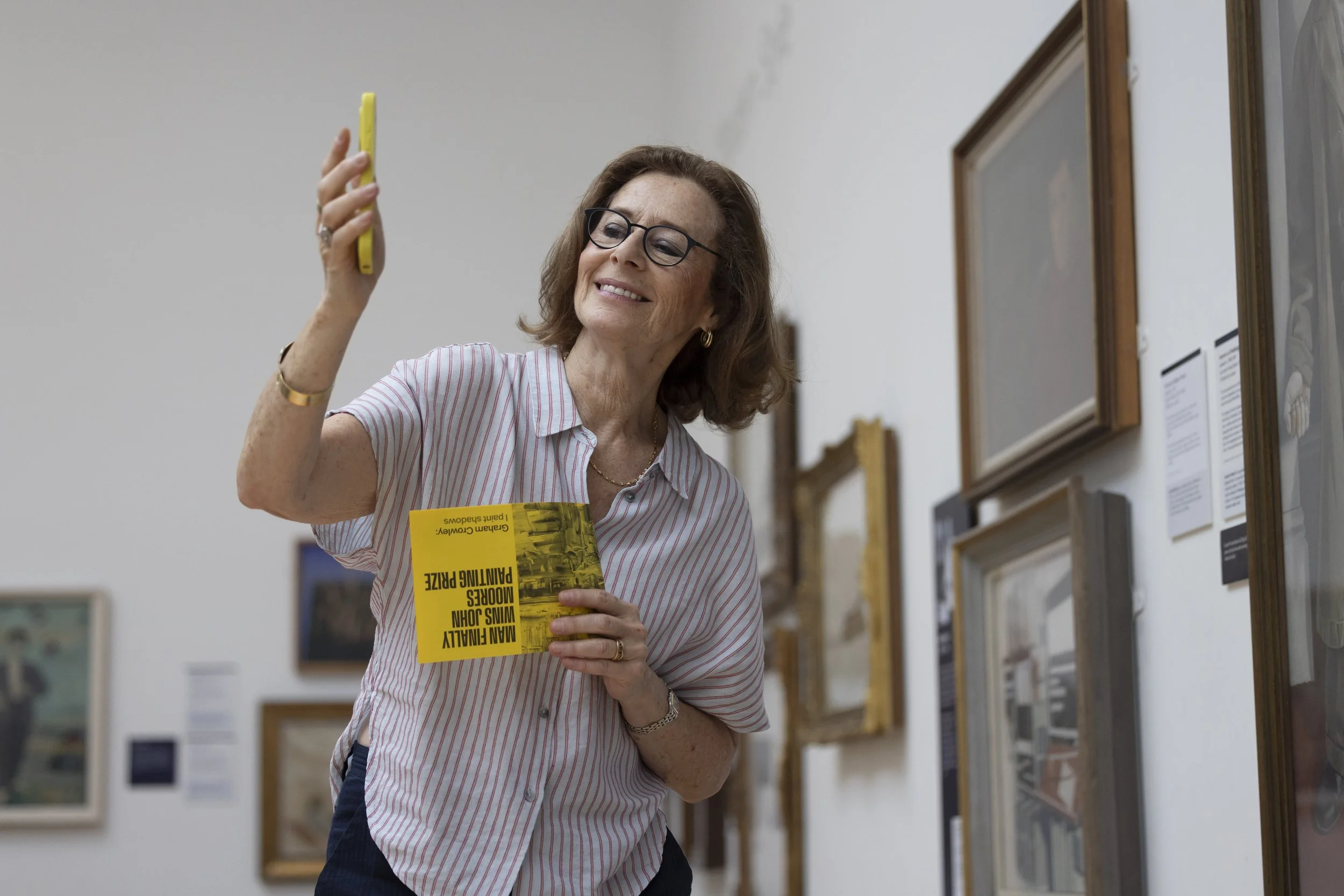 Art Fund patron takes a selfie with artwork in the Walker Art Gallery, Liverpool