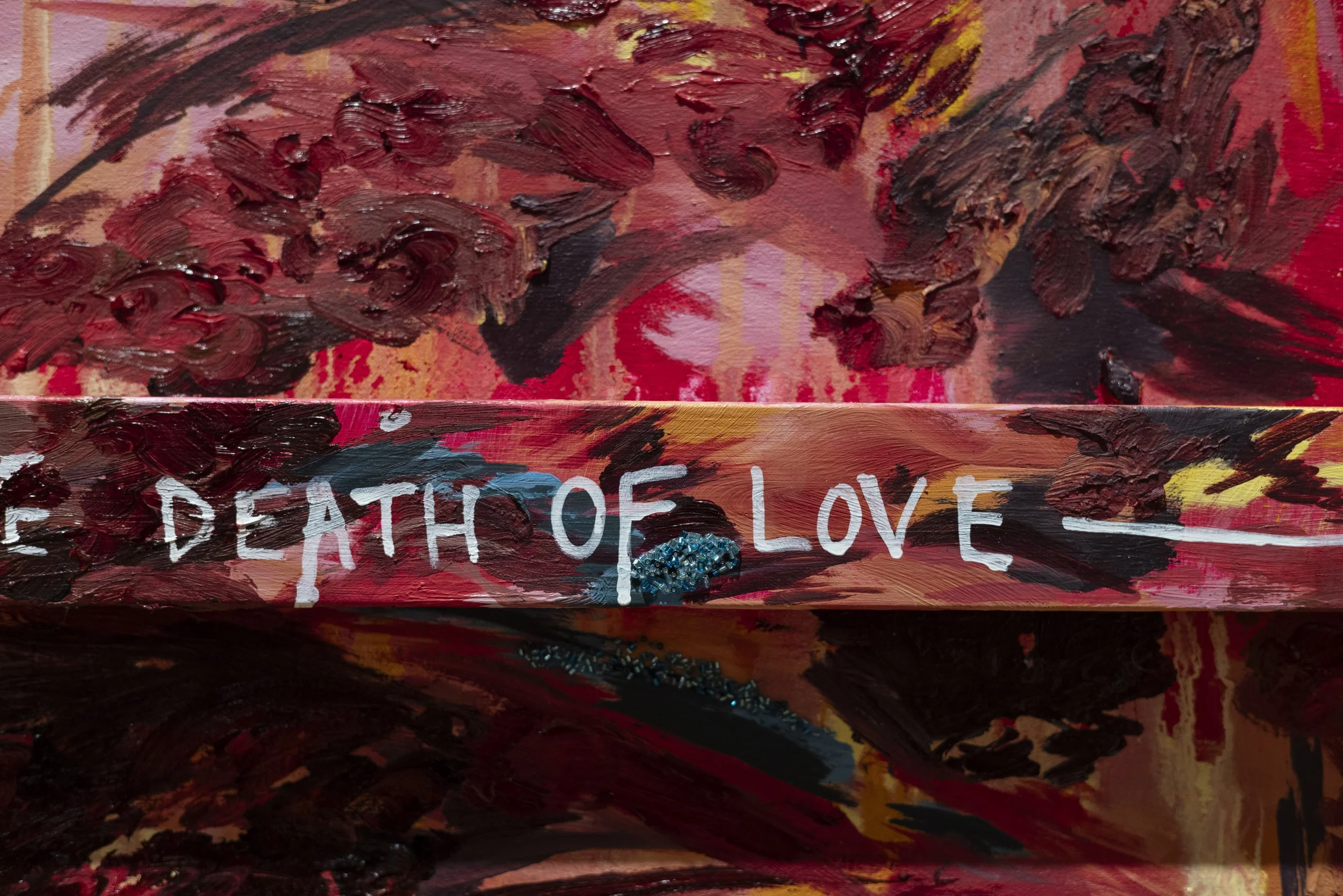 Close-up of painting titled “Death of Love” by Michaela Yearwood-Dan.