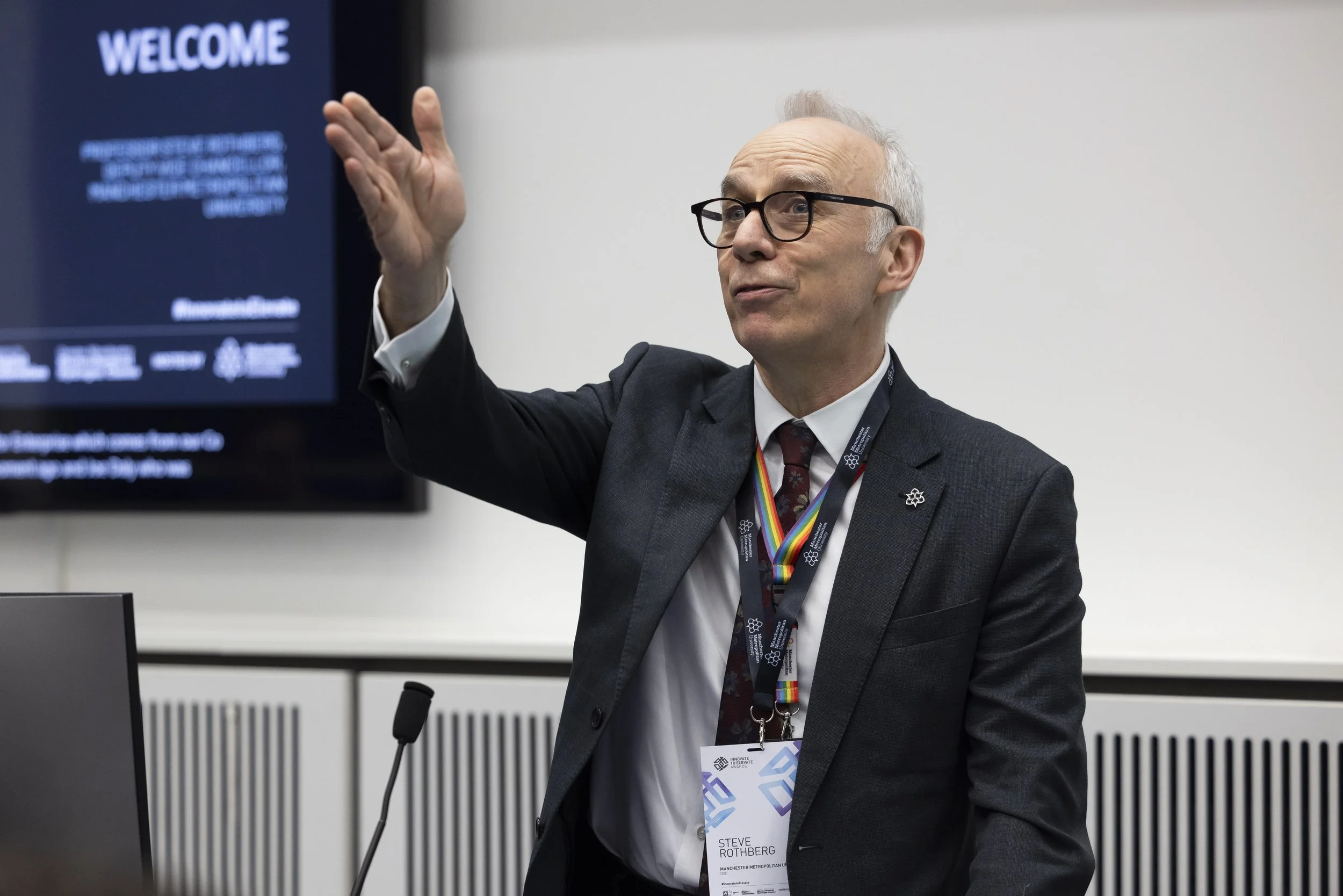 A delegate giving a presentation at a conference in Manchester