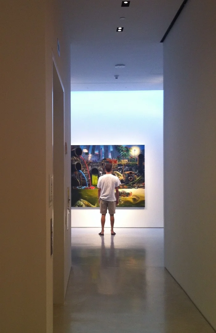 Alexis Rockman in front of his painting Gowanus, Photo by Kisa Lala - Painting: Gowanus, 2013, Oil on wood, 72 x 90 inches exhibited at Sperone Westwater Gallery
