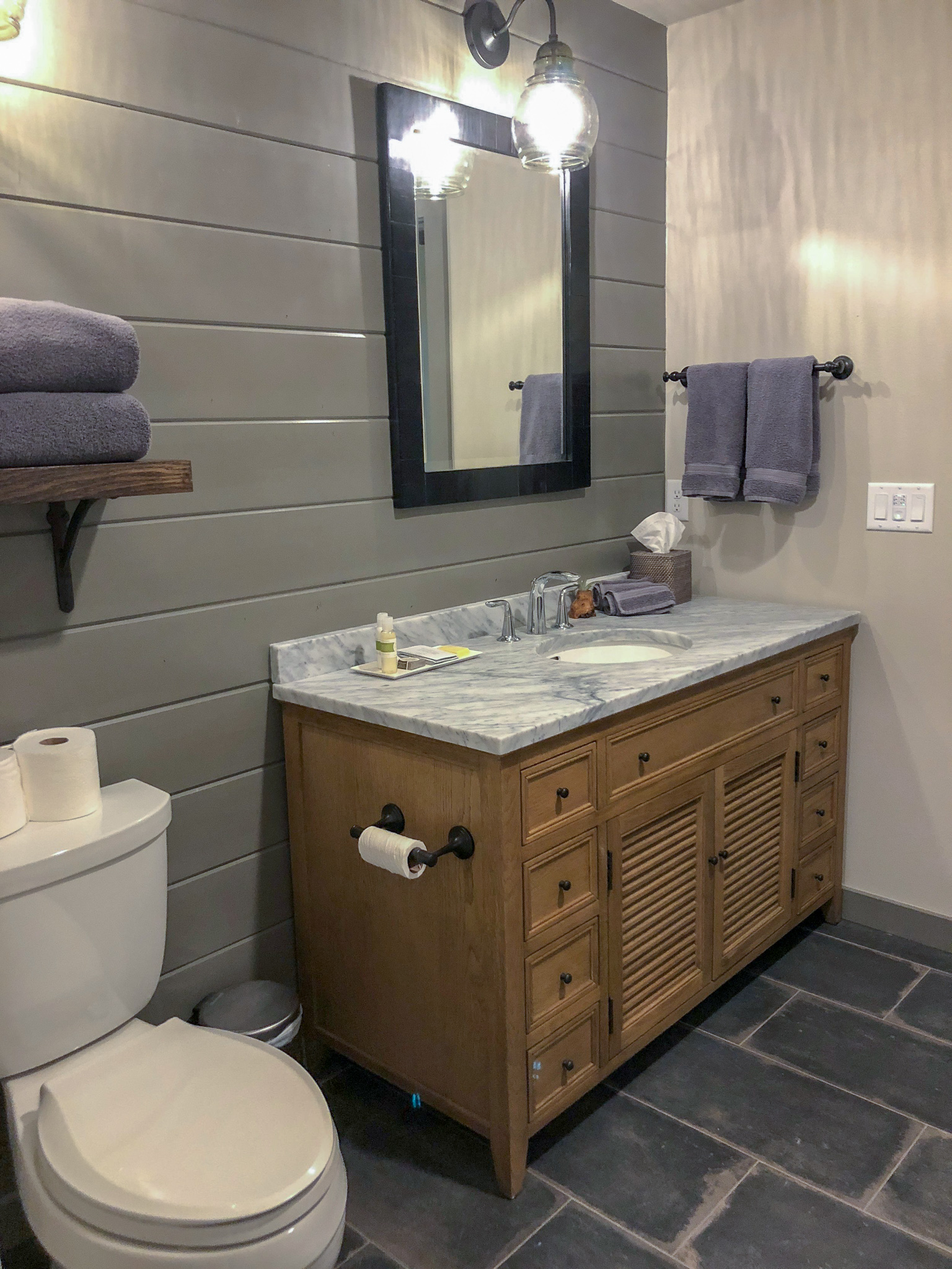 The bathroom comes with a full vanity and handmade lavender bath products