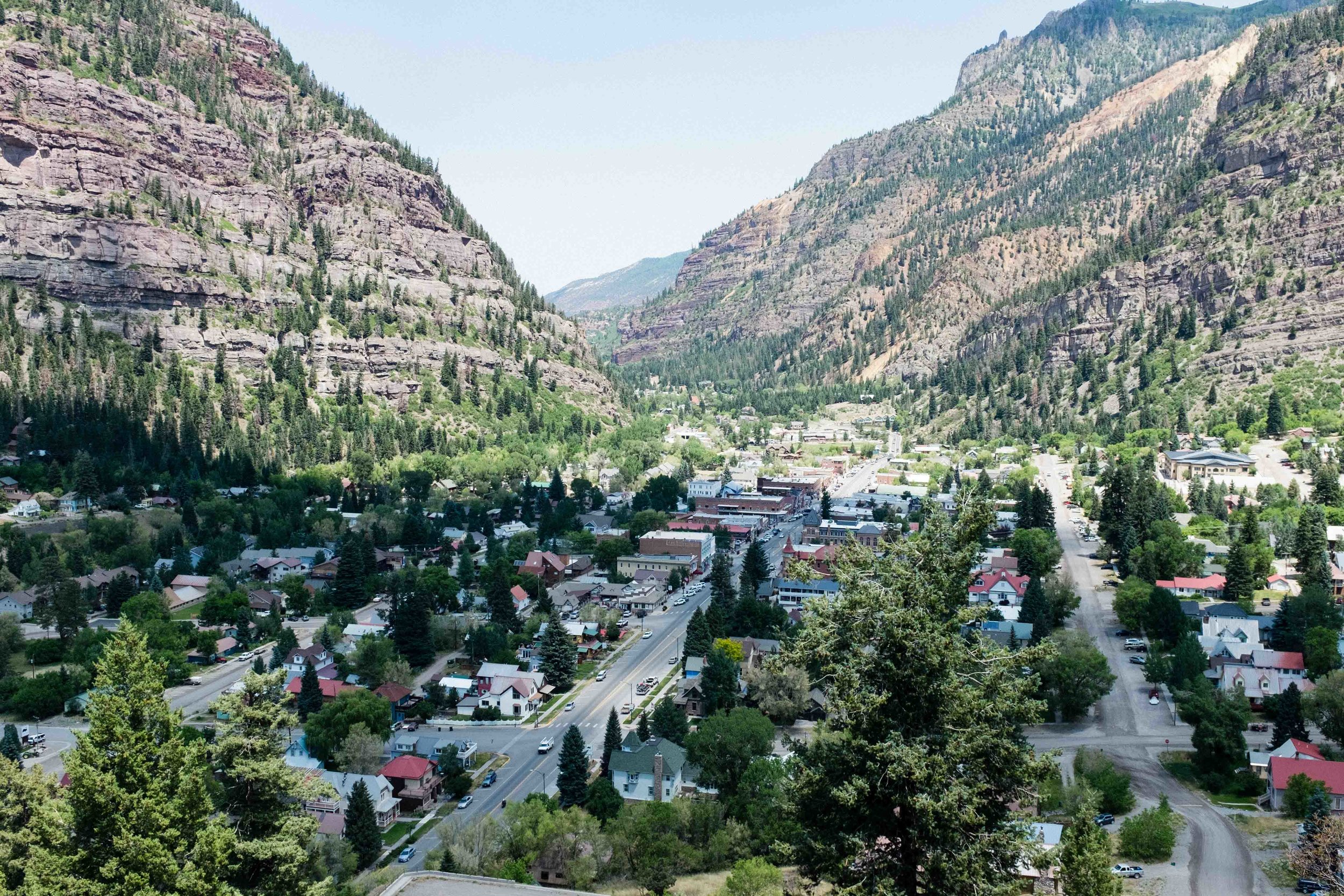 Ouray: Gateway to the Million Dollar Highway. Here we began climbing up Red Mountain Pass, 13 miles, 4,500' of elevation gain and a summit over 11,000 ft. There was an equal sense of awe over the beauty surrounding us, and the daunting physical task that lay ahead.