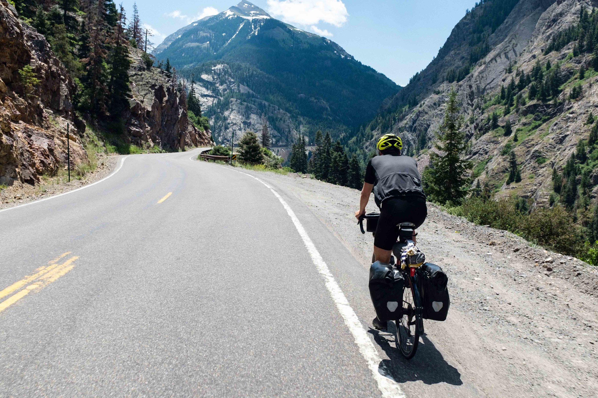 Ben just CRUISING up Red Mountain Pass. Consistent grades around 6% kept things fairly low key. But you can expect to take around 2 hours to make it to the top if you're on a fully loaded bike.