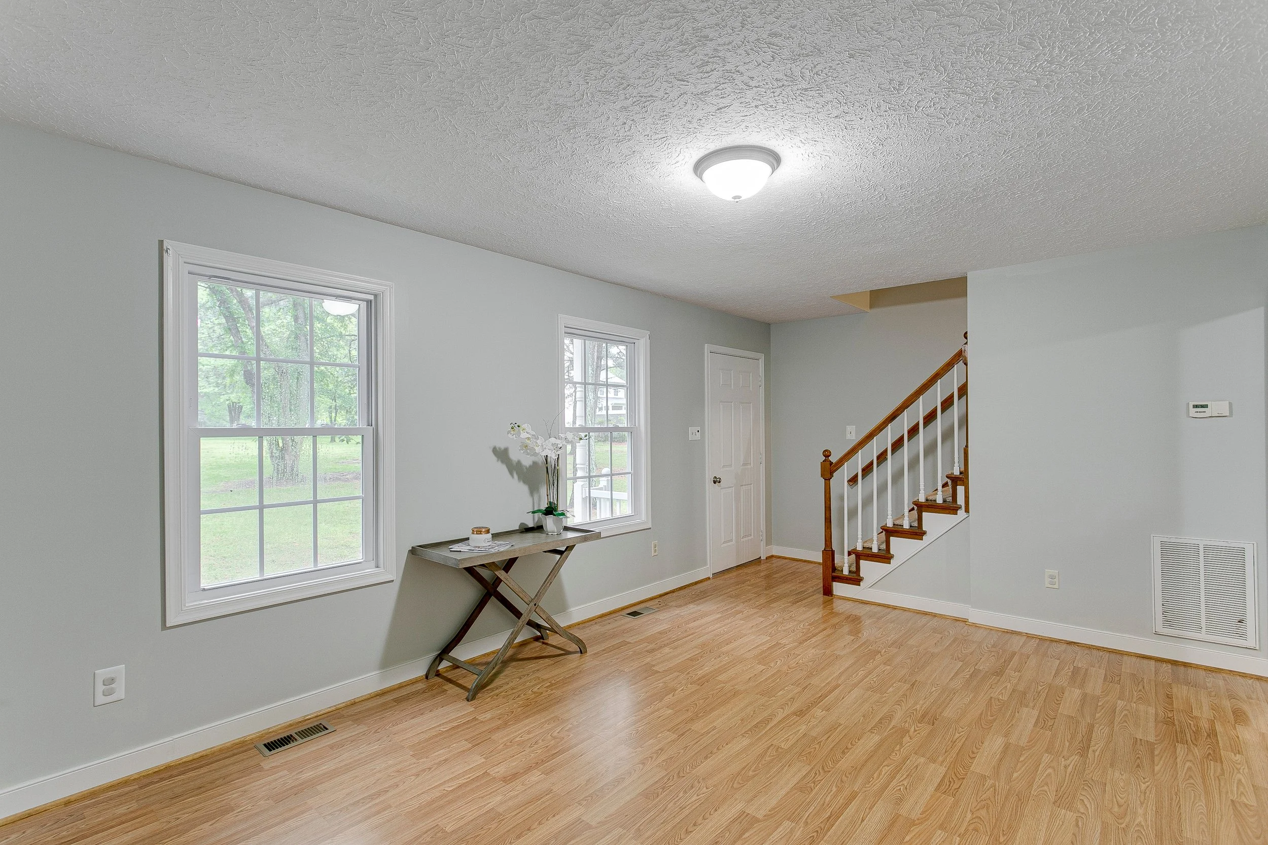 How to change a light bulb in a flush mount fixture