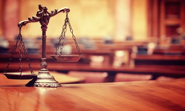 scales empty courtroom-Article-201401271547.jpg