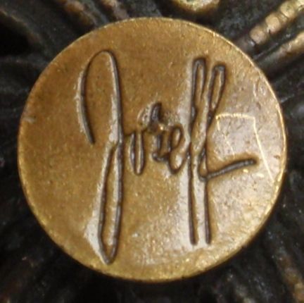 Round script “tag” one of the earliest runs. You can see that it is deeper than the later tags.