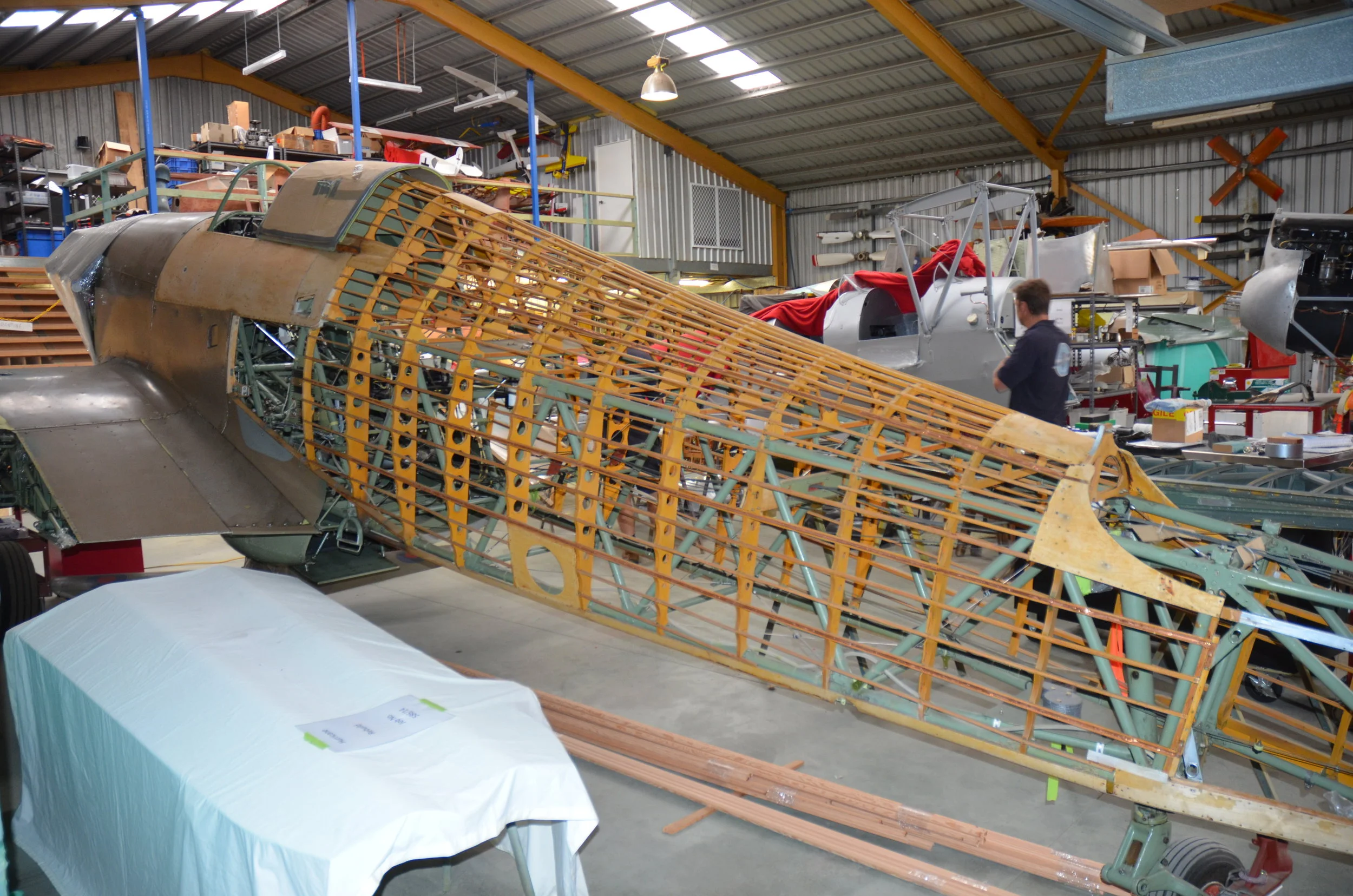 Fuselage undergoing restoration of the wooden structure.