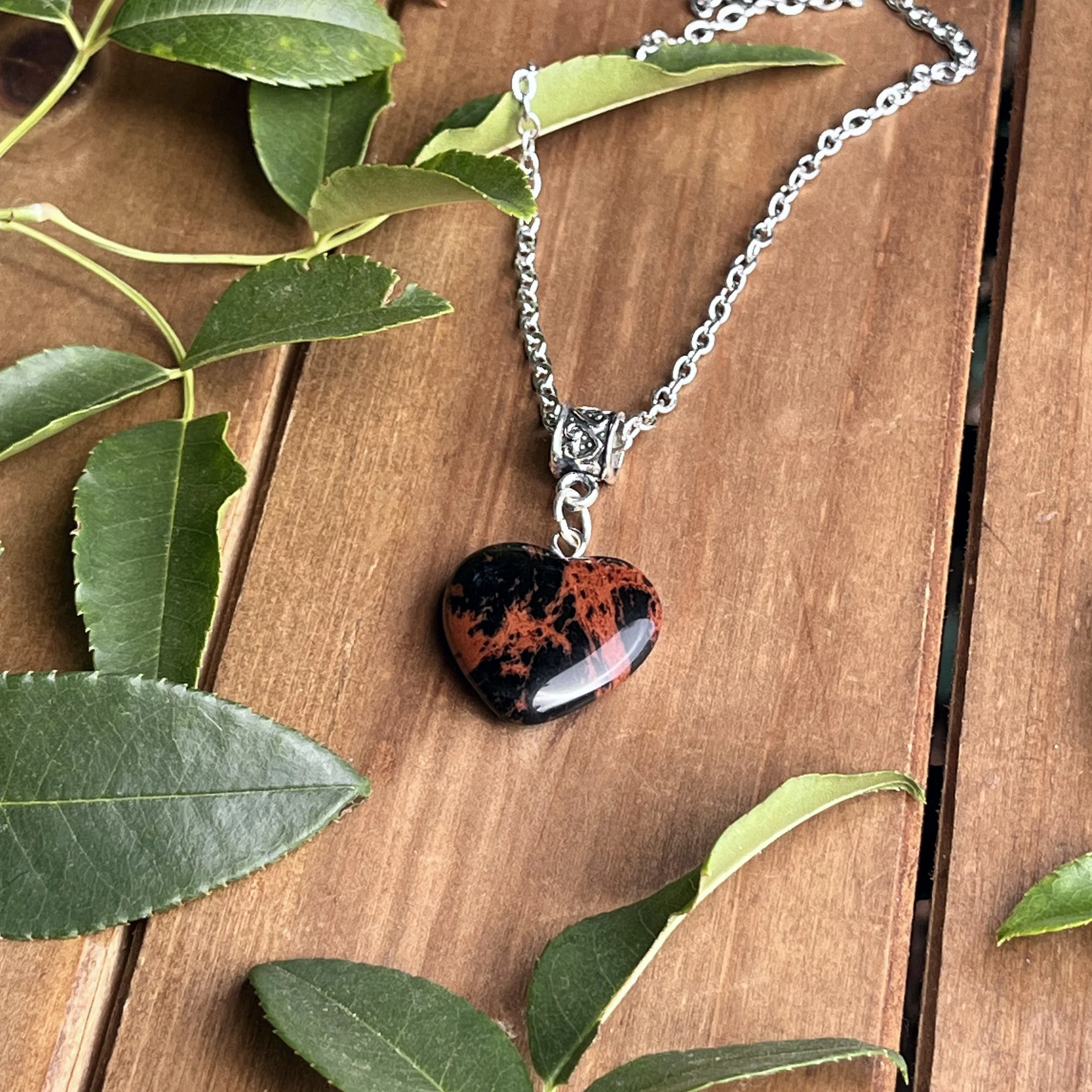 red and black gemstone heart necklace