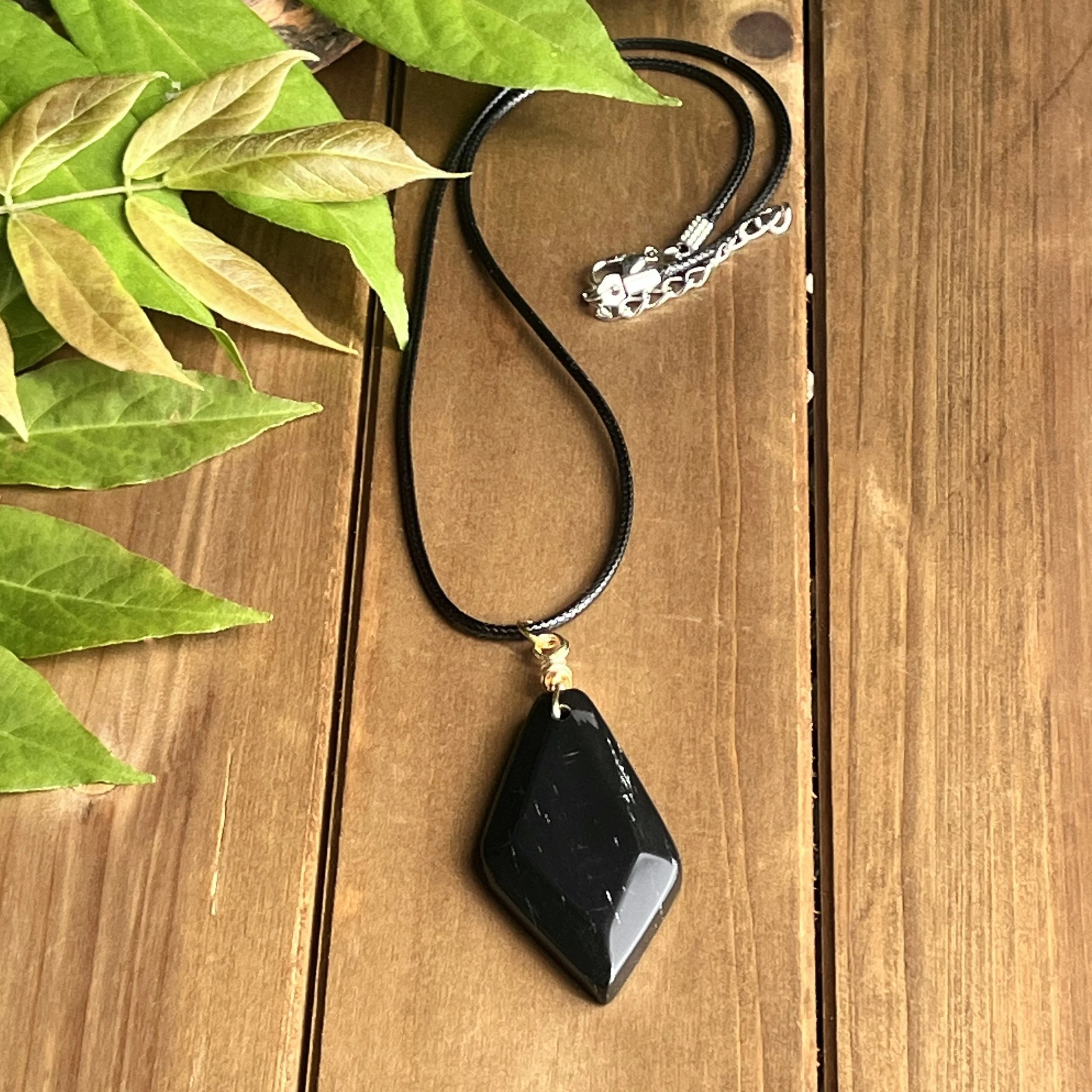 black gemstone necklace for protection