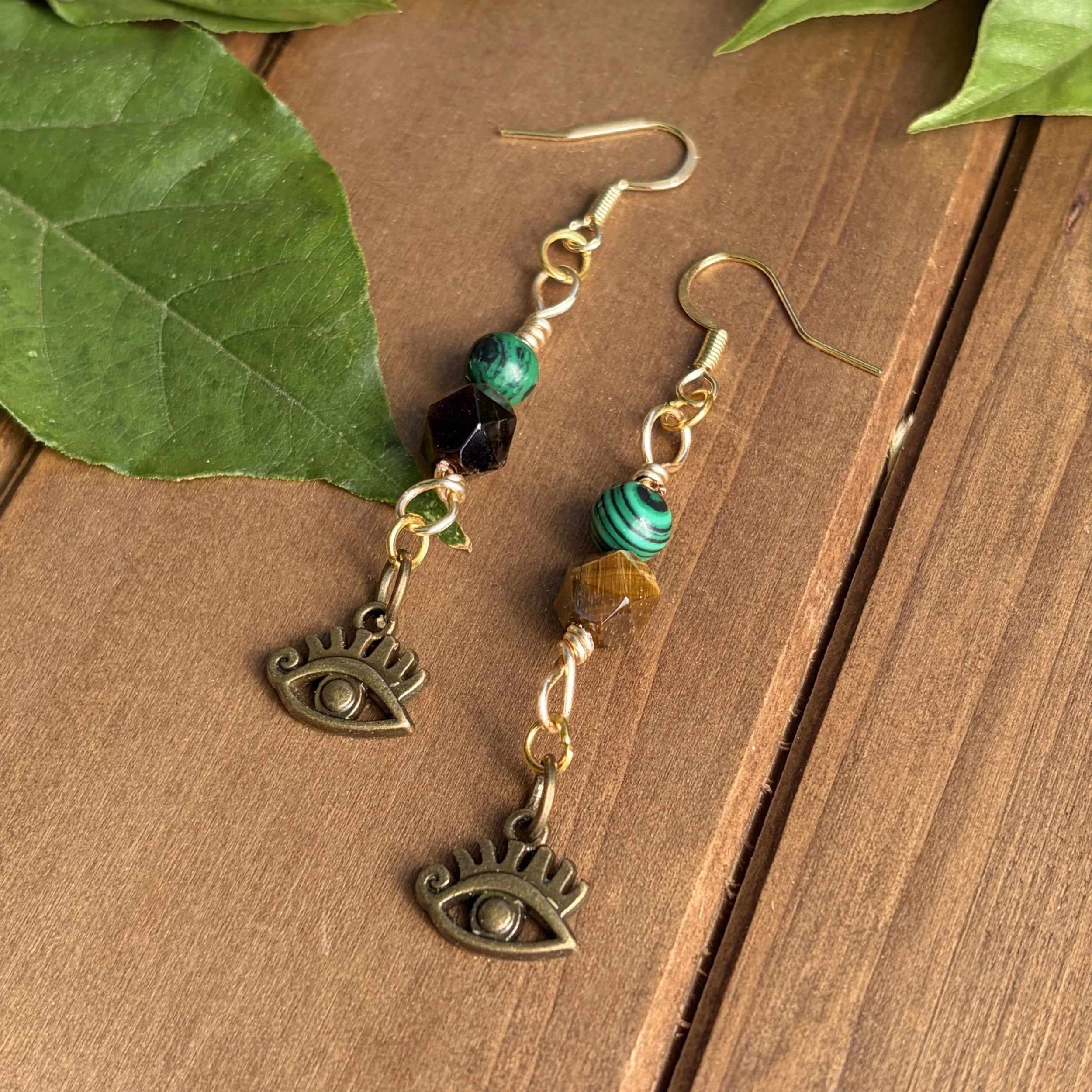 Eye earrings with natural gemstones