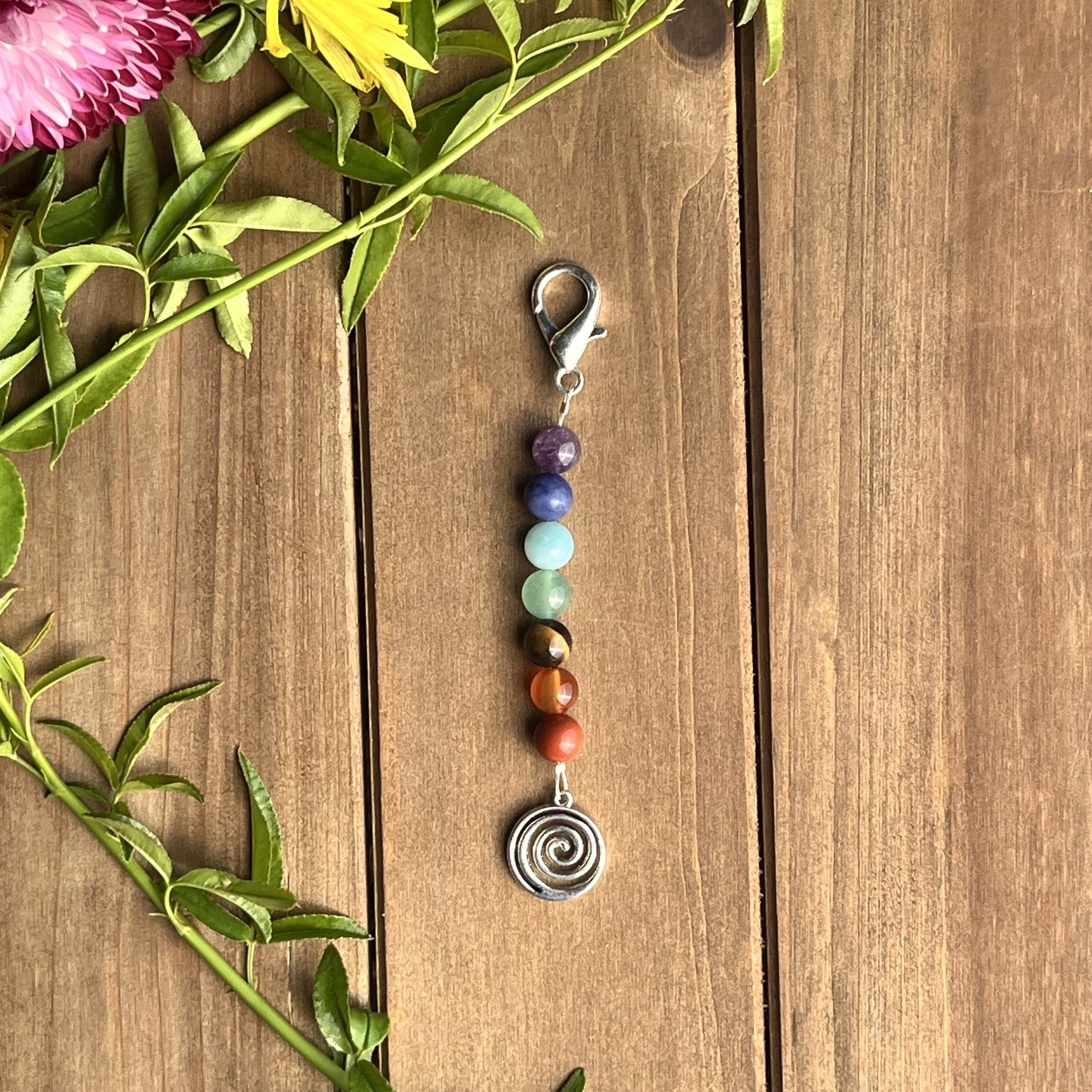 chakra bead charm with swirl