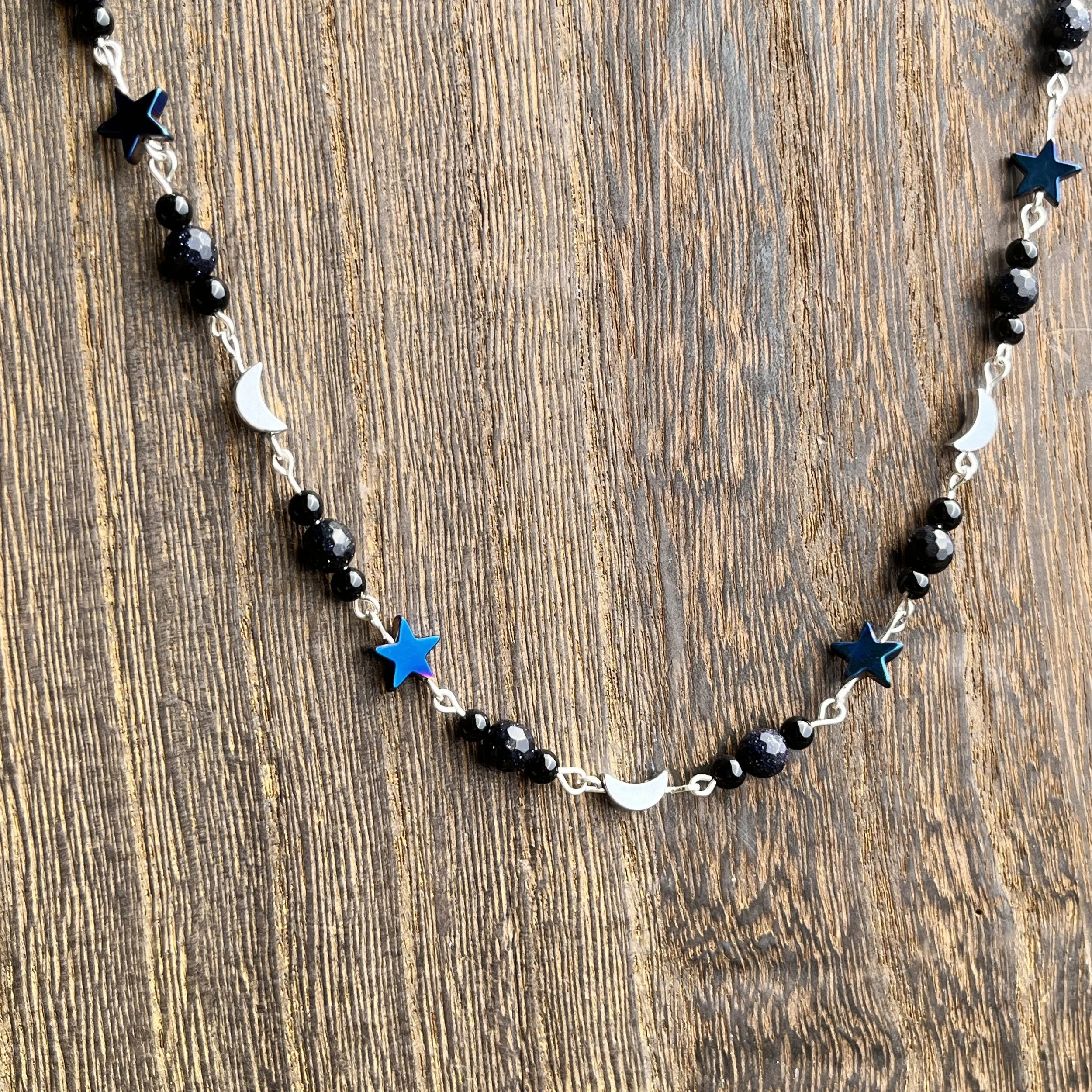 gemstone necklace with moon and stars
