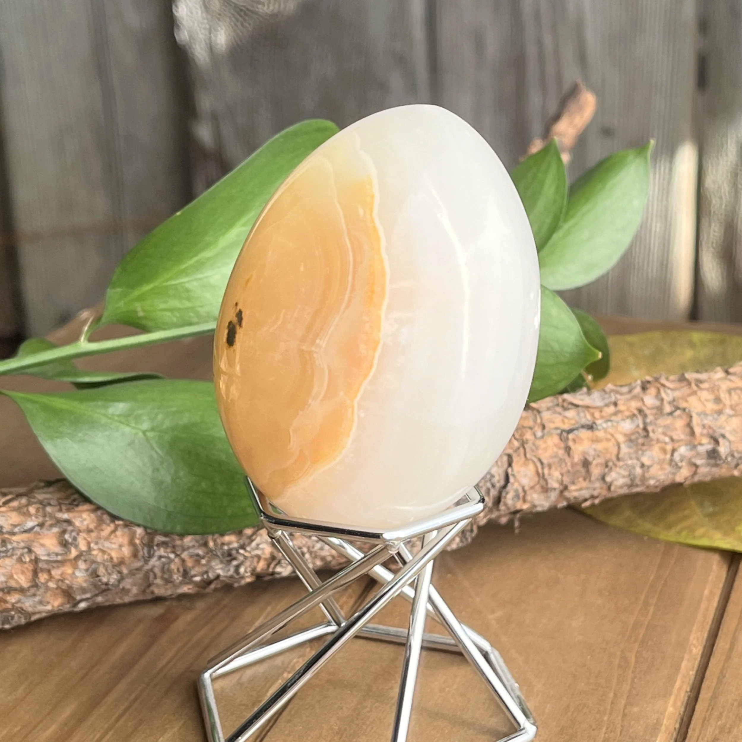 yellow gemstone egg with stand