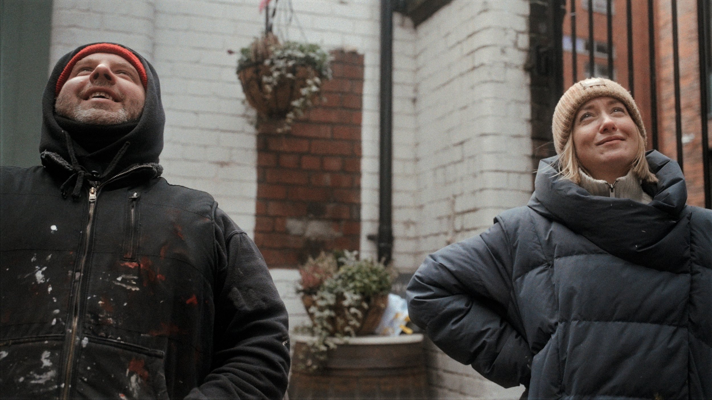 Person in winter coat on a street — outdoor location portrait photography