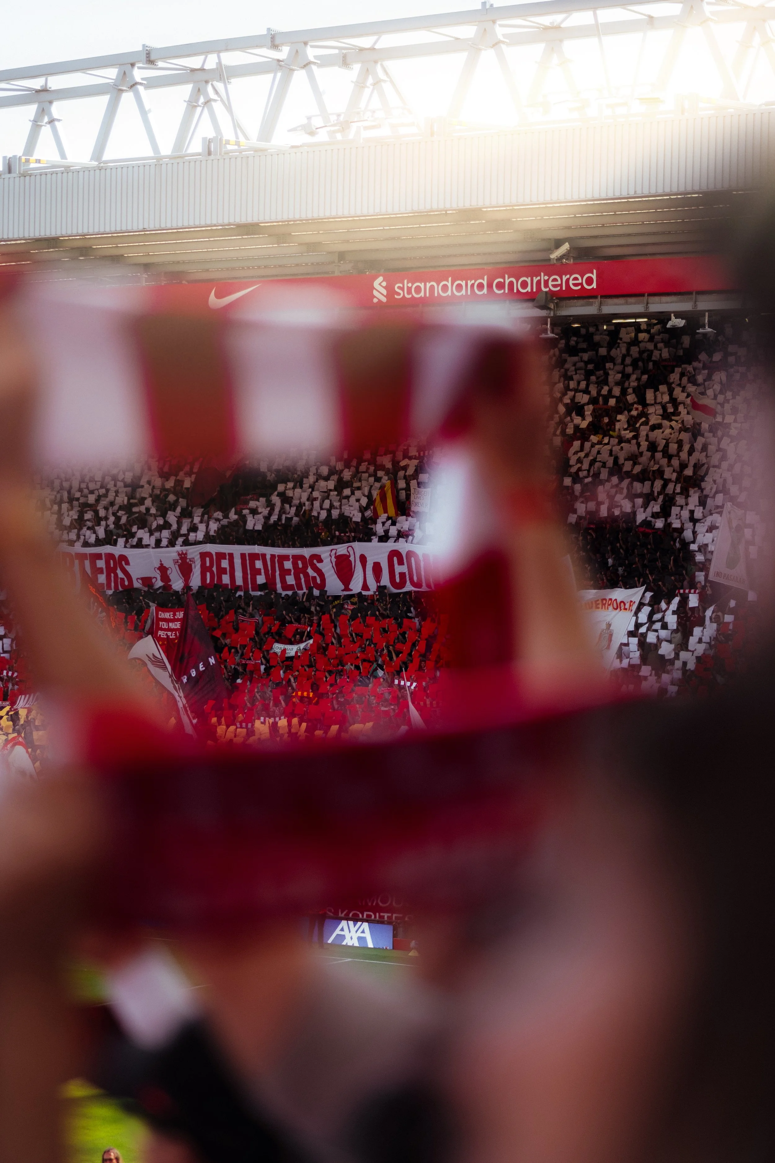 Liverpool FC Anfield scarf and banner close-up — football match day atmosphere photography