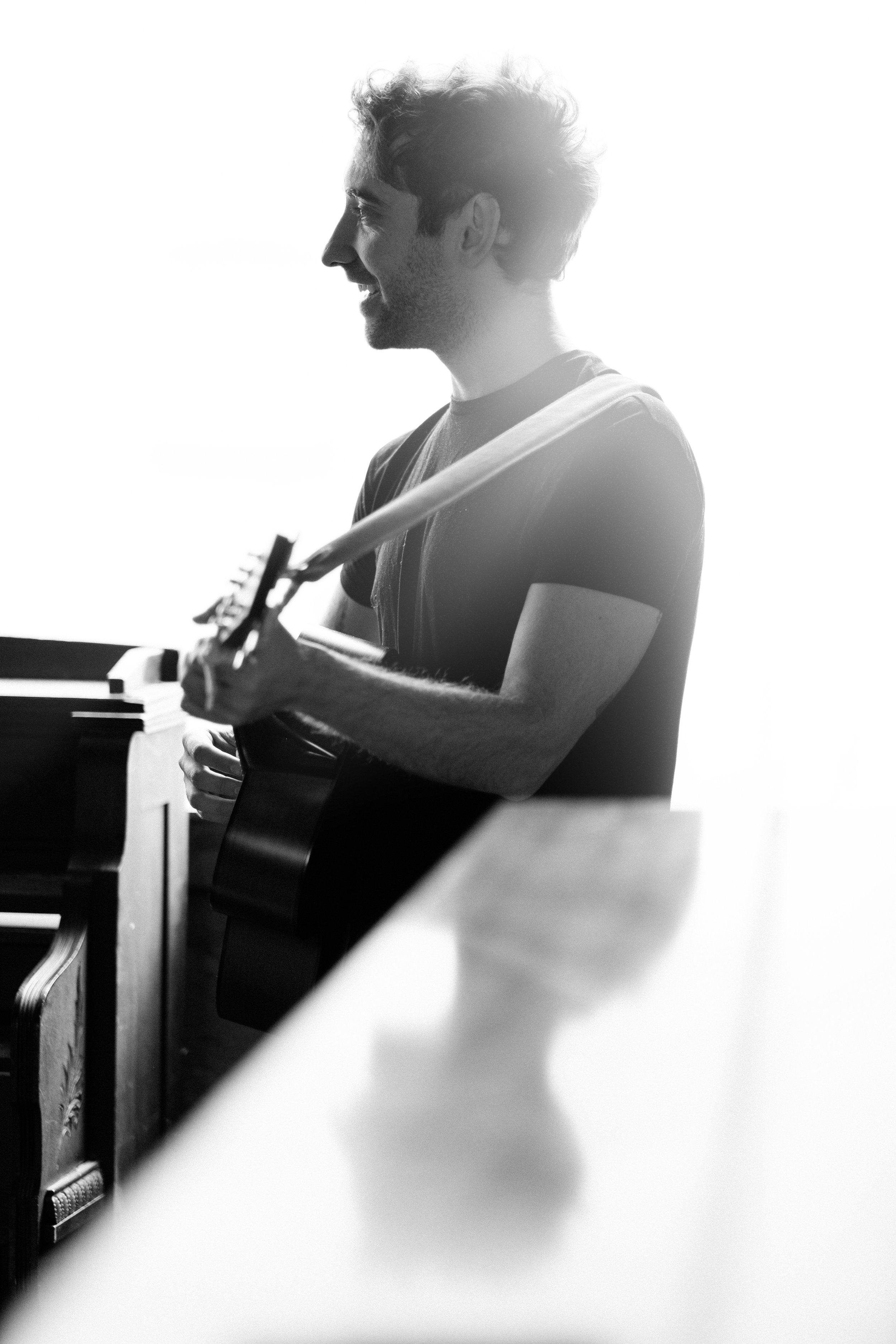 Musician in profile at a music stand — black and white music photography session
