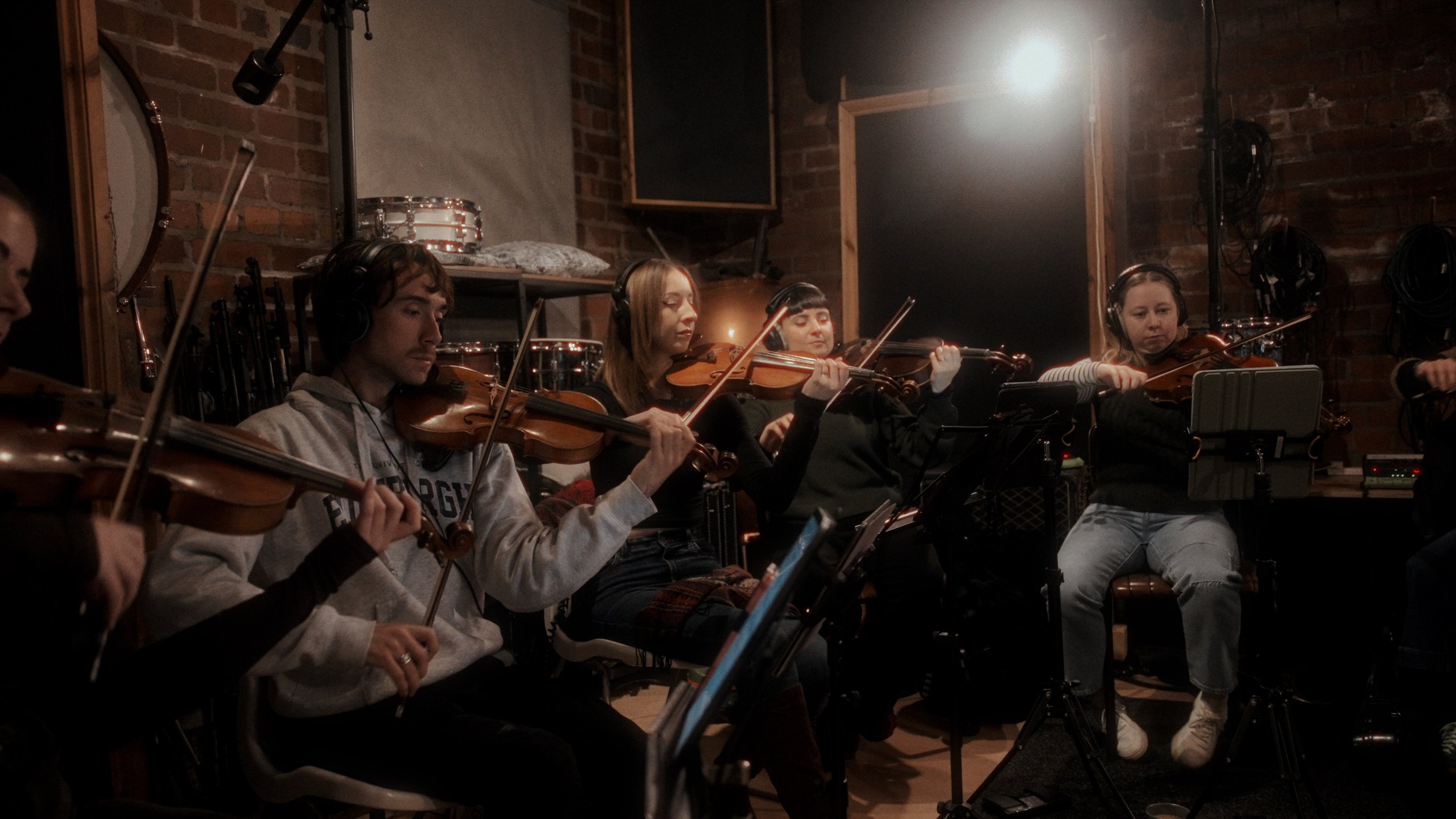 String quartet rehearsal — live music event photography, musicians with violins
