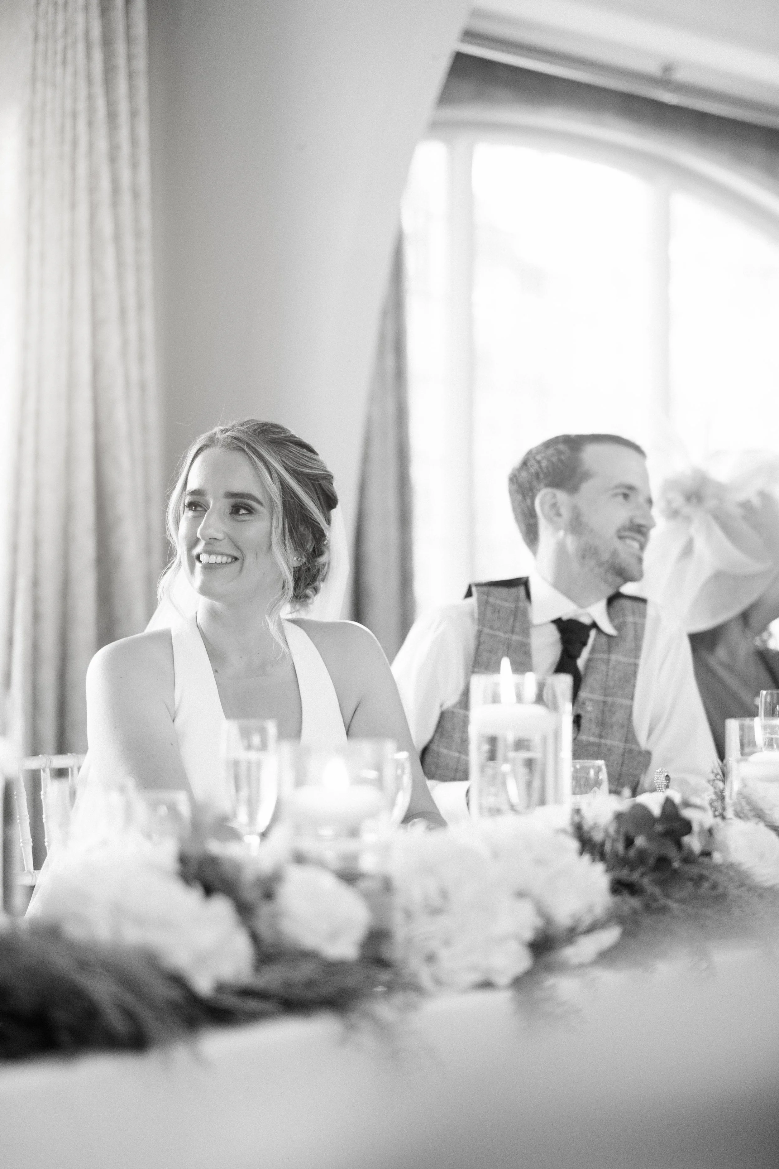 Wedding reception candid — bride and groom at celebration, event photography Liverpool