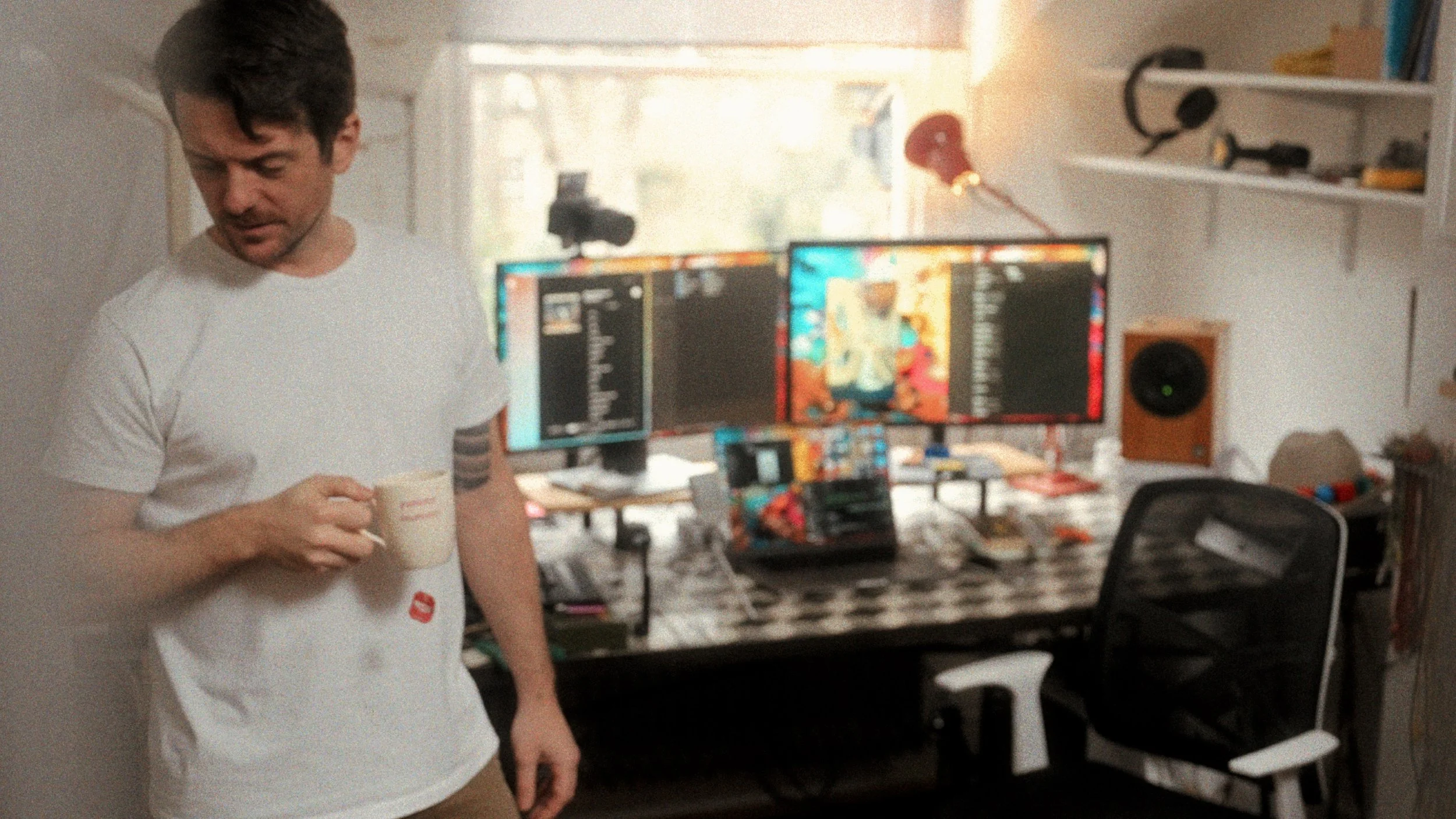 Creative workspace with dual monitors — photographer and designer at work, home studio