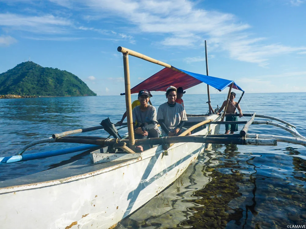 Tin and Bryan head out on survey, to look for whale sharks.