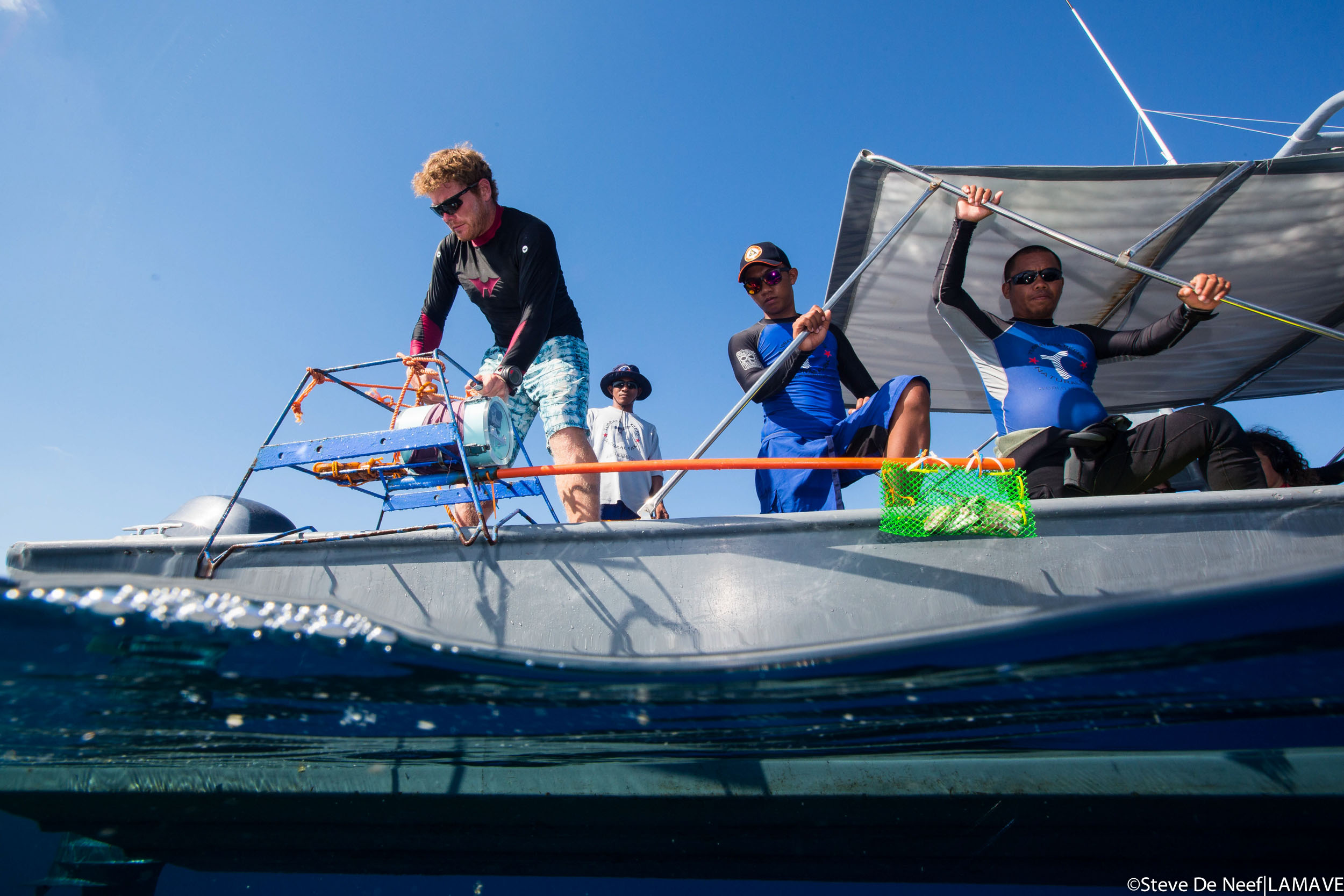   Photo 4. Lead author Ryan Murray with the Rangers of Tubbataha Reefs including Segundo Conales Jr (right).       