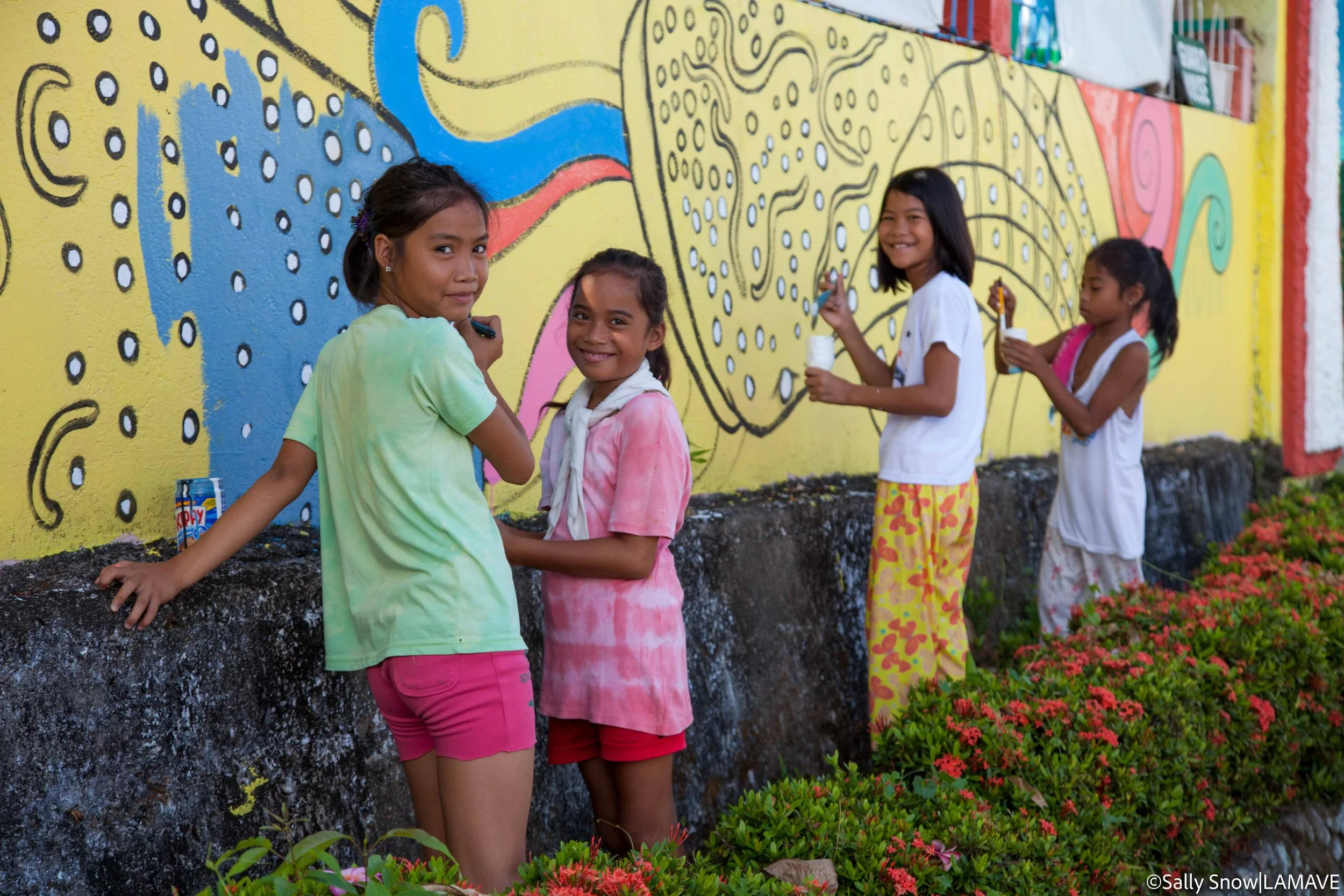 Mural painting with AG Sano in Pintuyan at the local school.