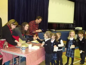 Preparing maple syrup ice for the students