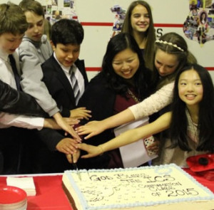 confirmation_cutting_cake-300x295.jpeg