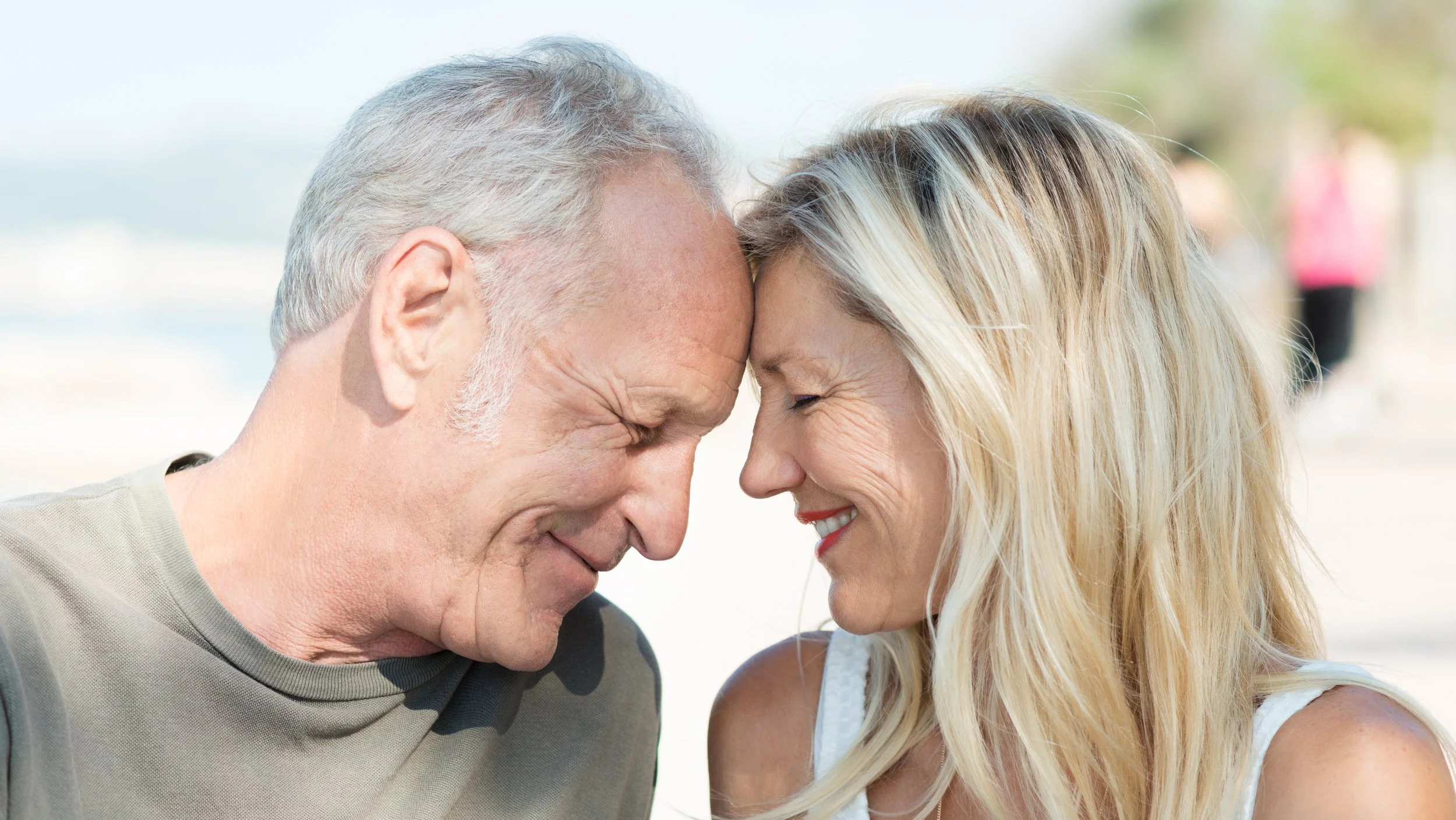 man woman touching forheads widescreen.jpg