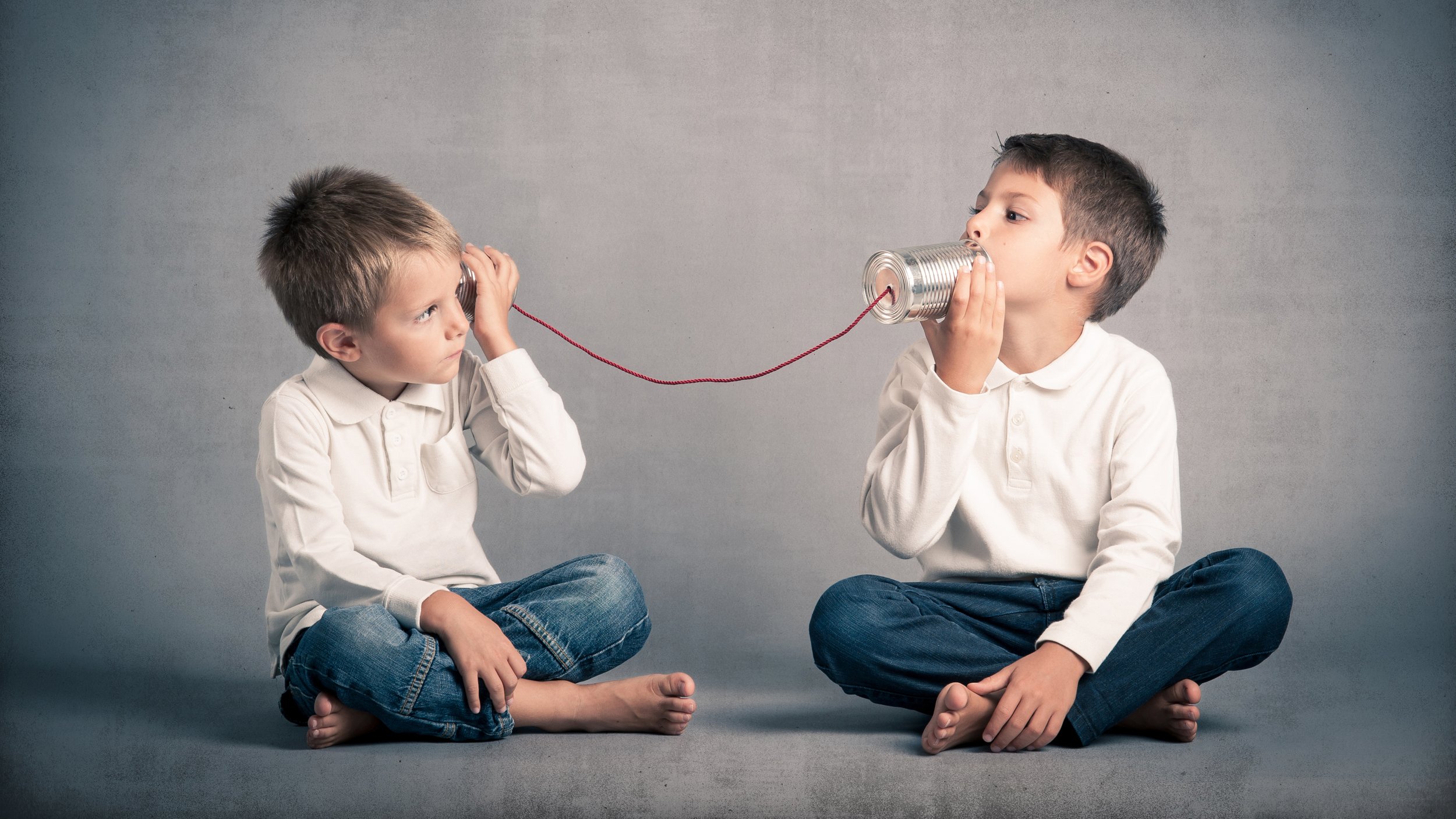 boys talking on tin can phone widescreen.jpg