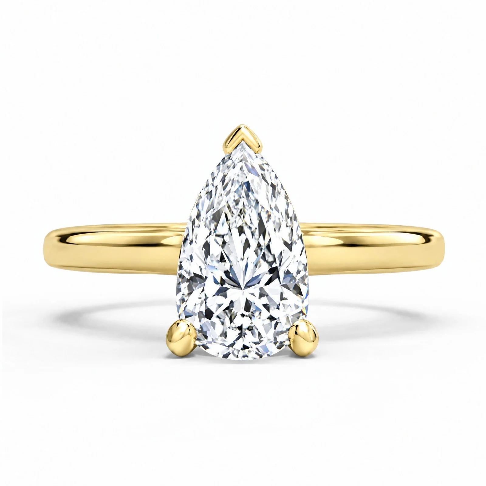 pear-moissanite-solitaire-engagement-ring-yellow-gold.jpg