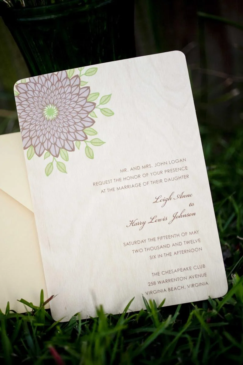 wood-wedding-invitation-with-purple-flower-design.jpg