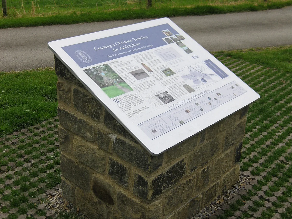    Above:  One of a pair of information boards that were produced for St Peter's Church in Addingham, showing a timeline of events throughout the church's history. The angled boards were mounted on specially constructed stone plinths.  